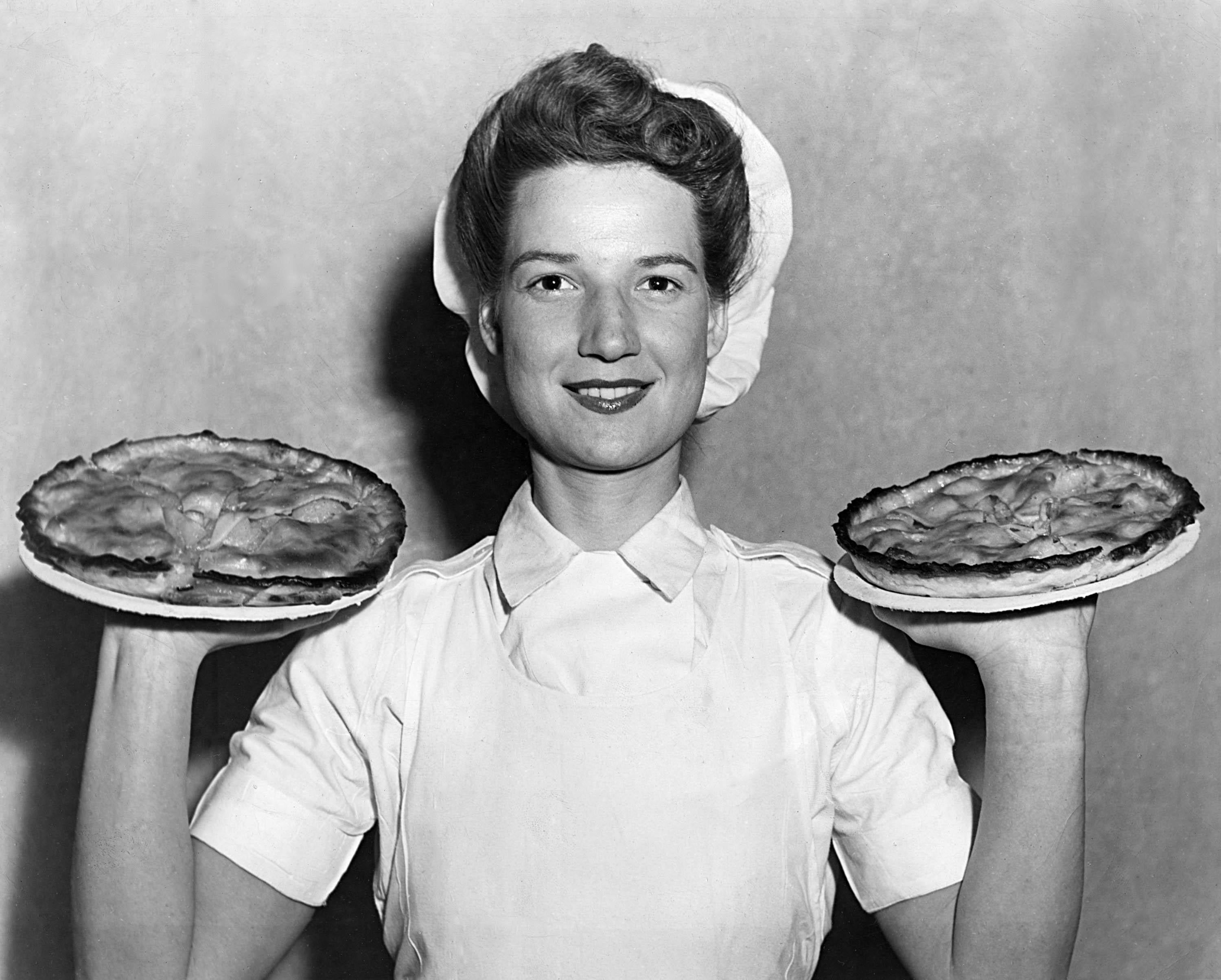 Unknown Black and White Photograph - Gal with Pies