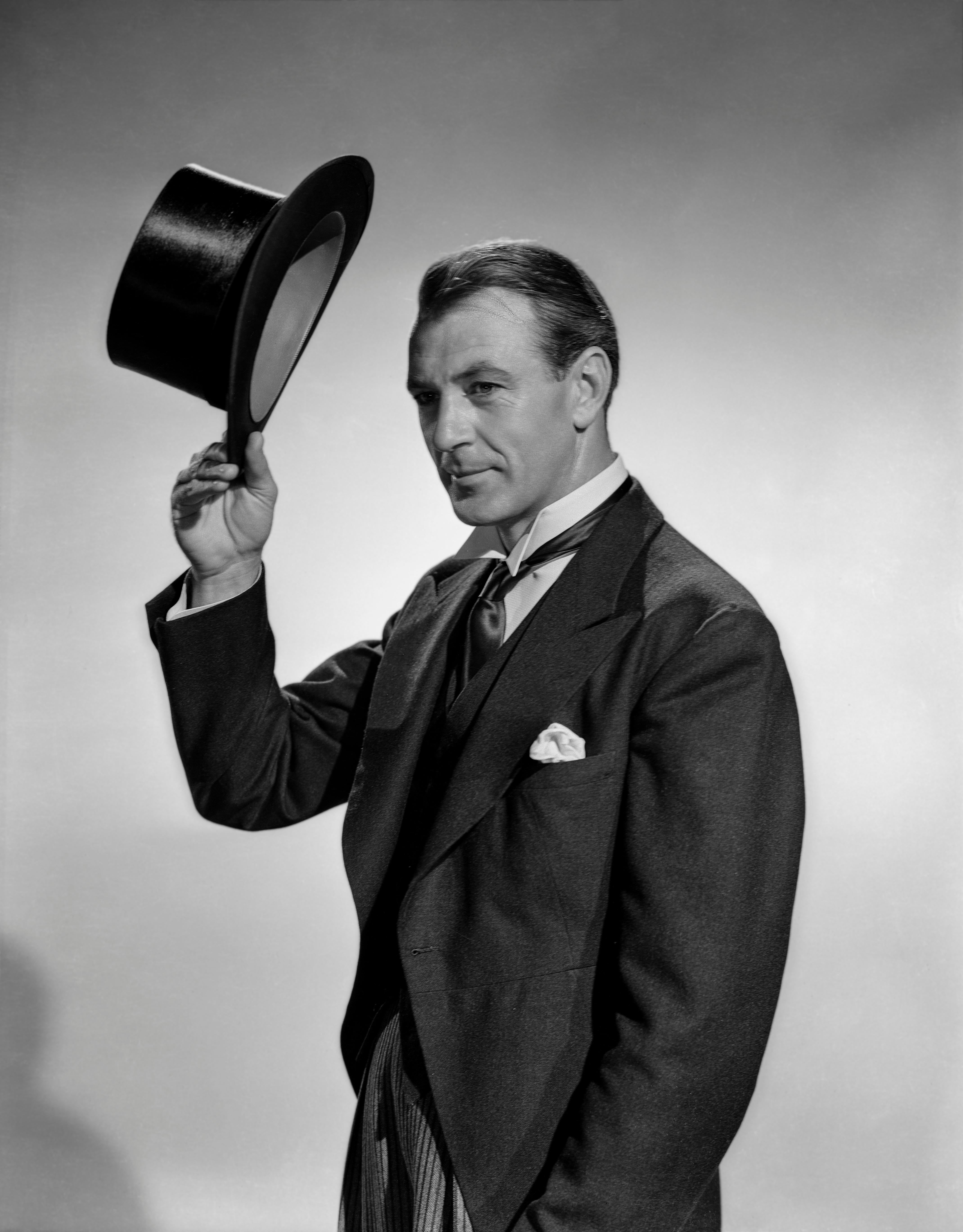 Unknown Portrait Photograph - Gary Cooper Tipping Tophat Movie Star News Fine Art Print