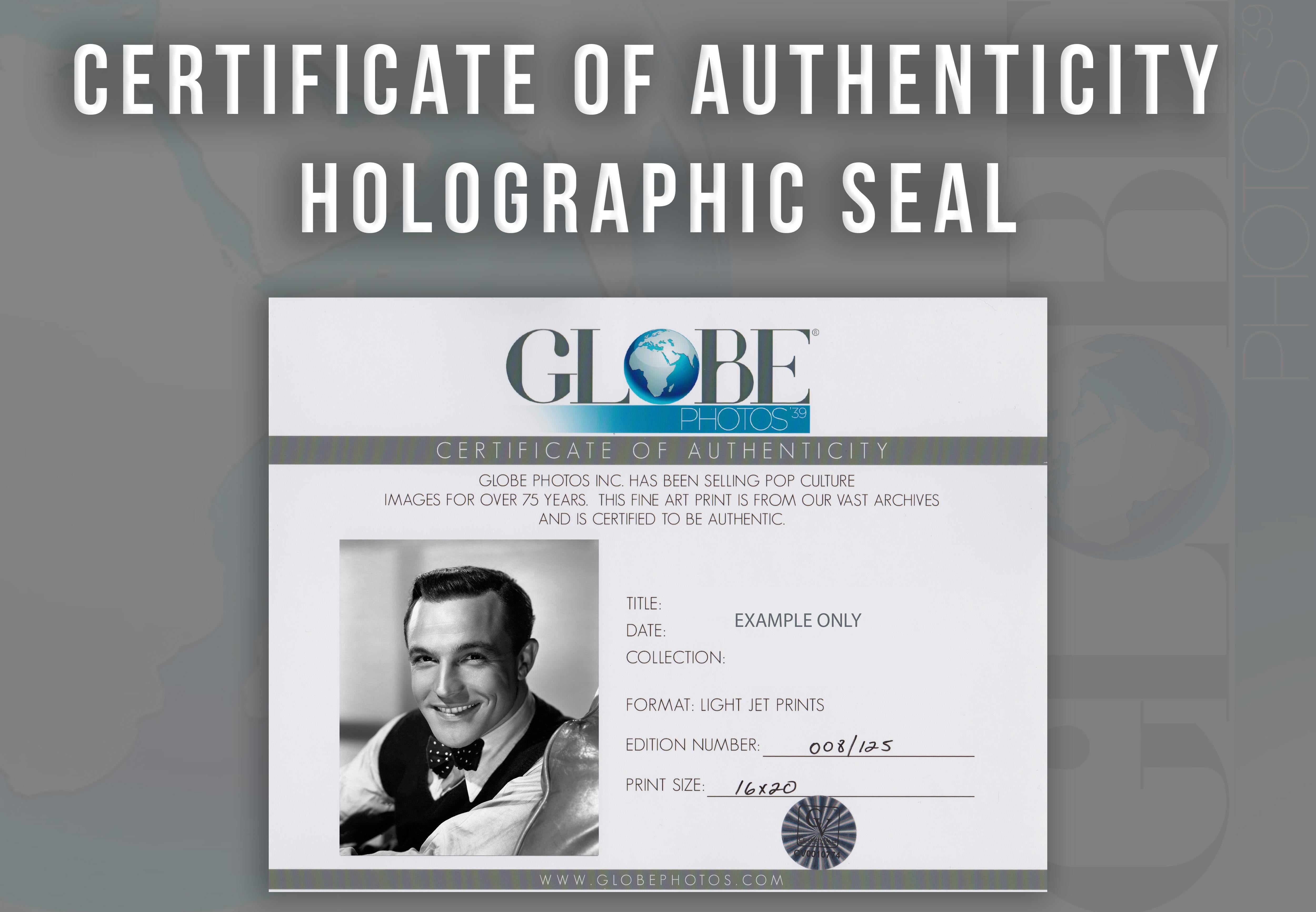 Gene Kelly: Big Smile in the Studio Globe Photos Fine Art Print - Gray Portrait Photograph by Unknown