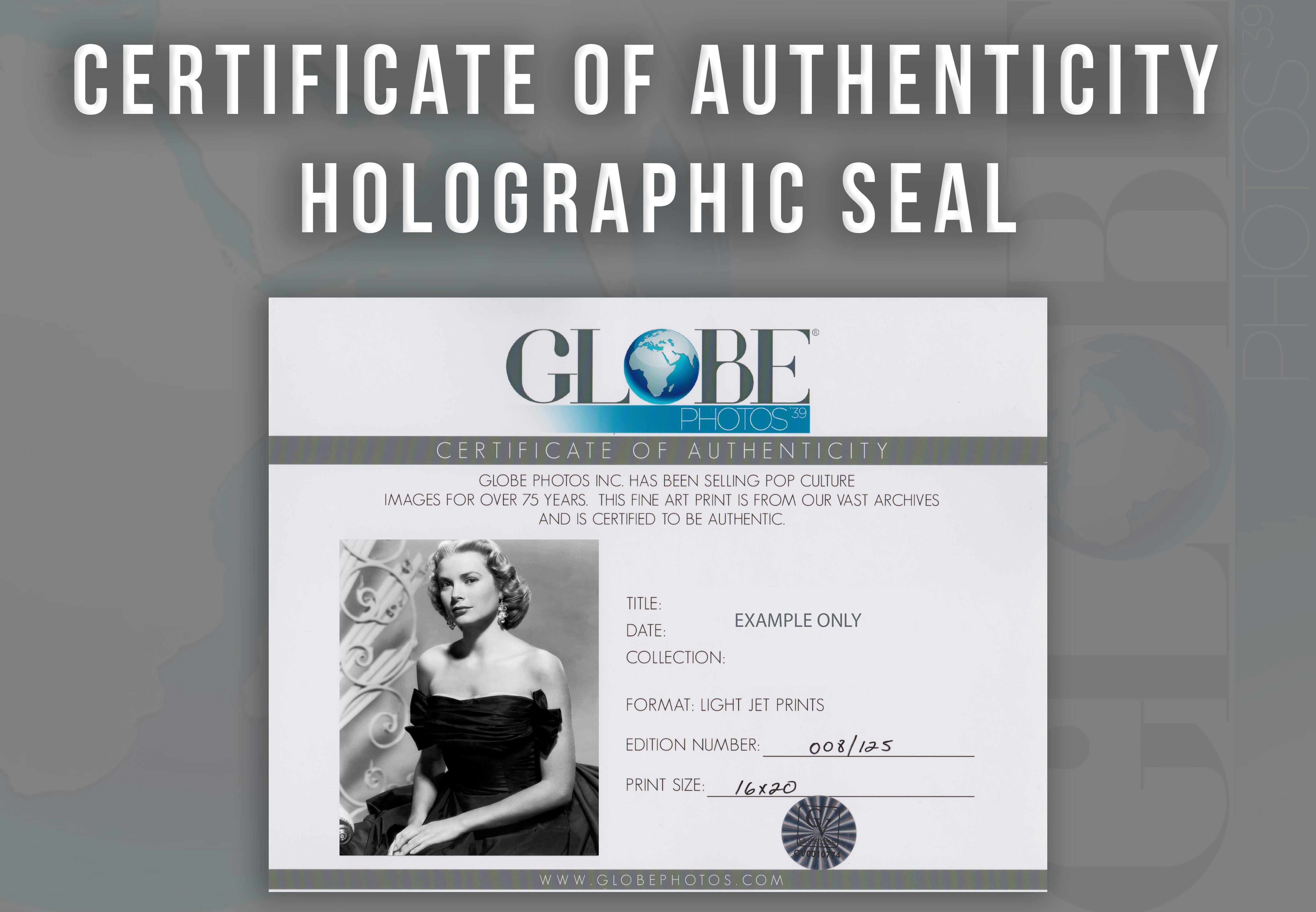 This classical black and white glamour portrait features Grace Kelly posed looking ot the camera, donned in diamond jewelry.

Grace Kelly was an American film actress who after starring in several significant films in the early- to mid-1950s became