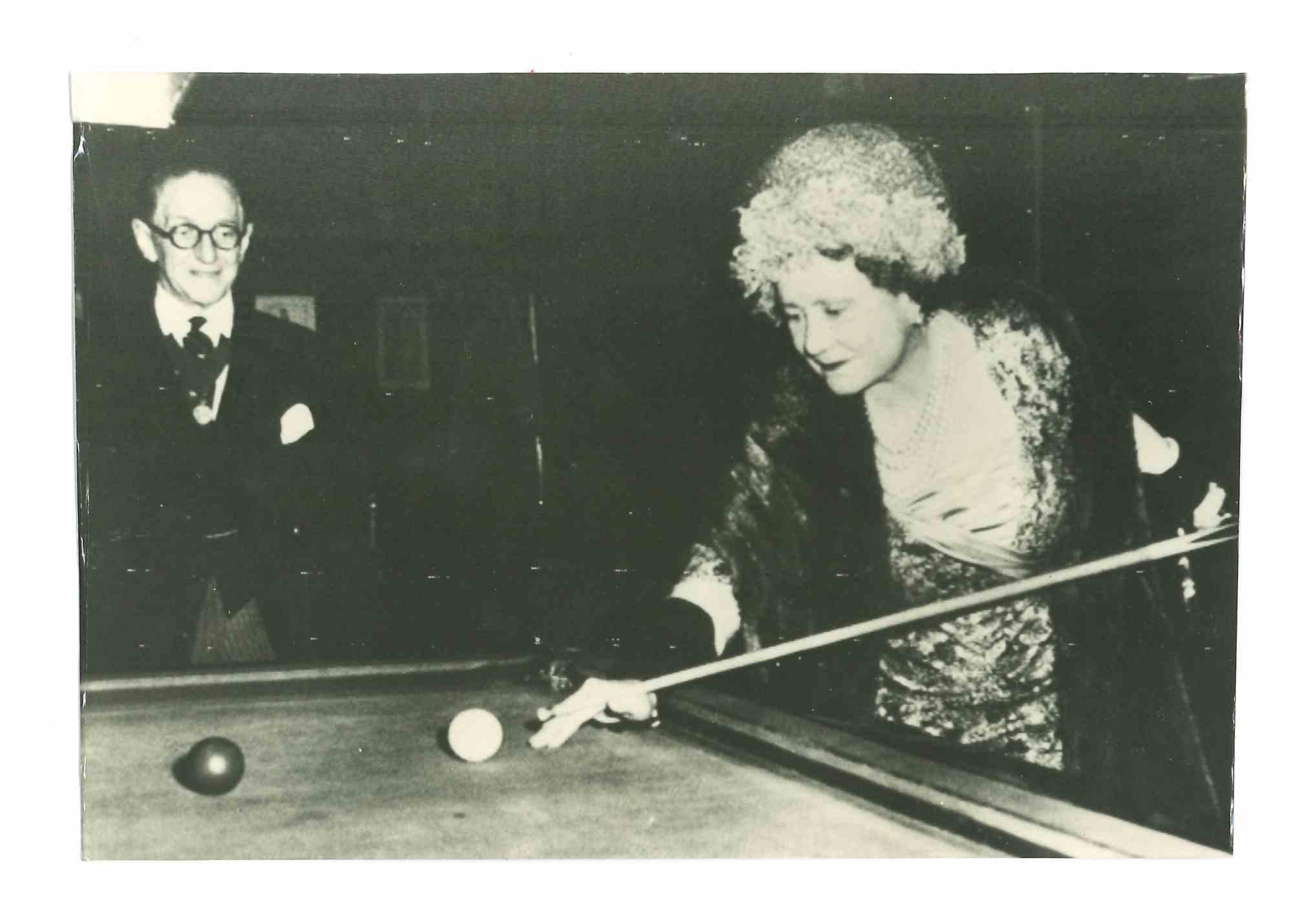 Unknown Figurative Photograph - Historical Photo  - Mother Queen  Playing  Billiard - 1960s