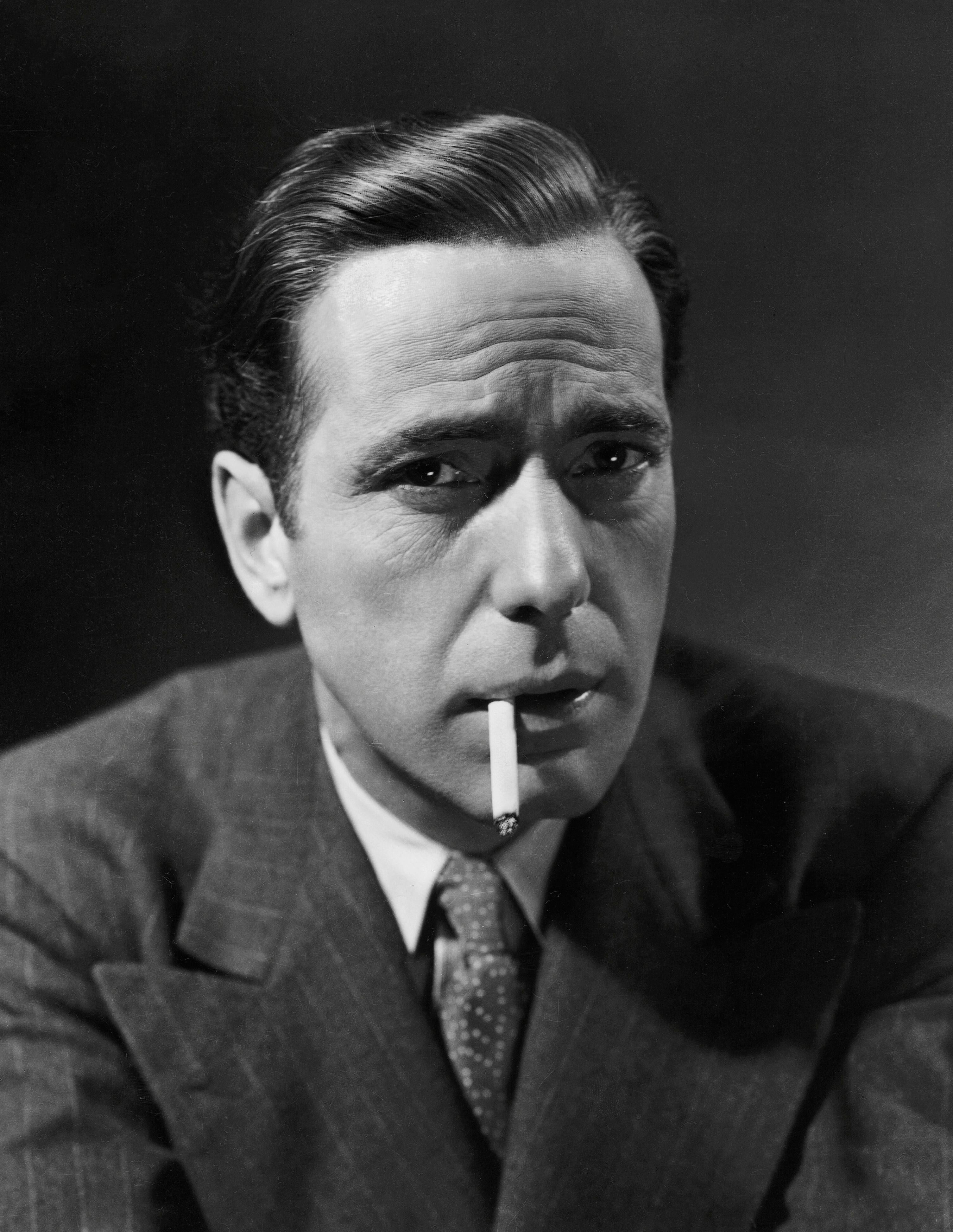 Unknown Black and White Photograph - Humphrey Bogart Smoking Globe Photos Fine Art Print