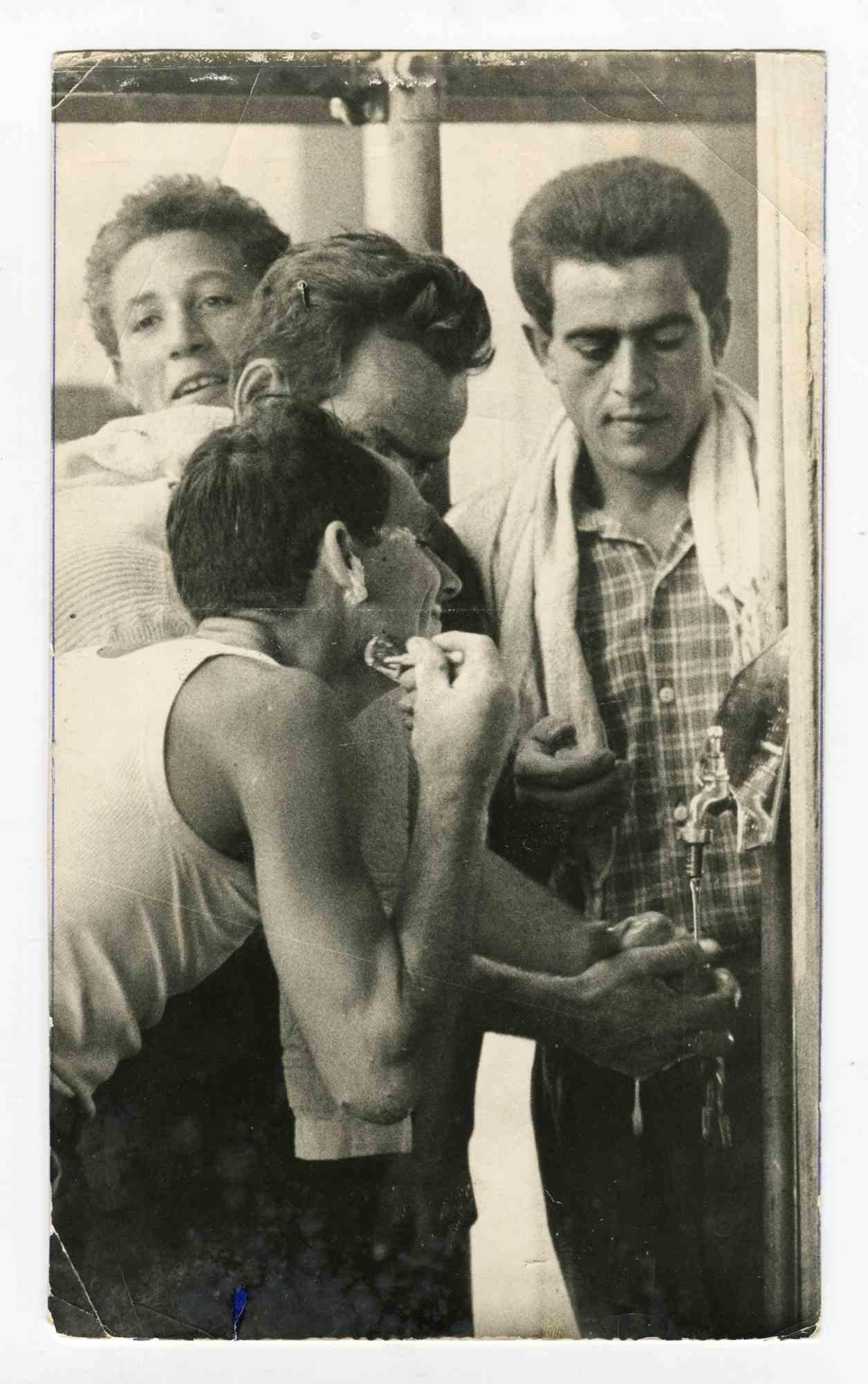 Unknown Black and White Photograph - Immigrants Shaving the Beard - Vintage Photograph - 1950s