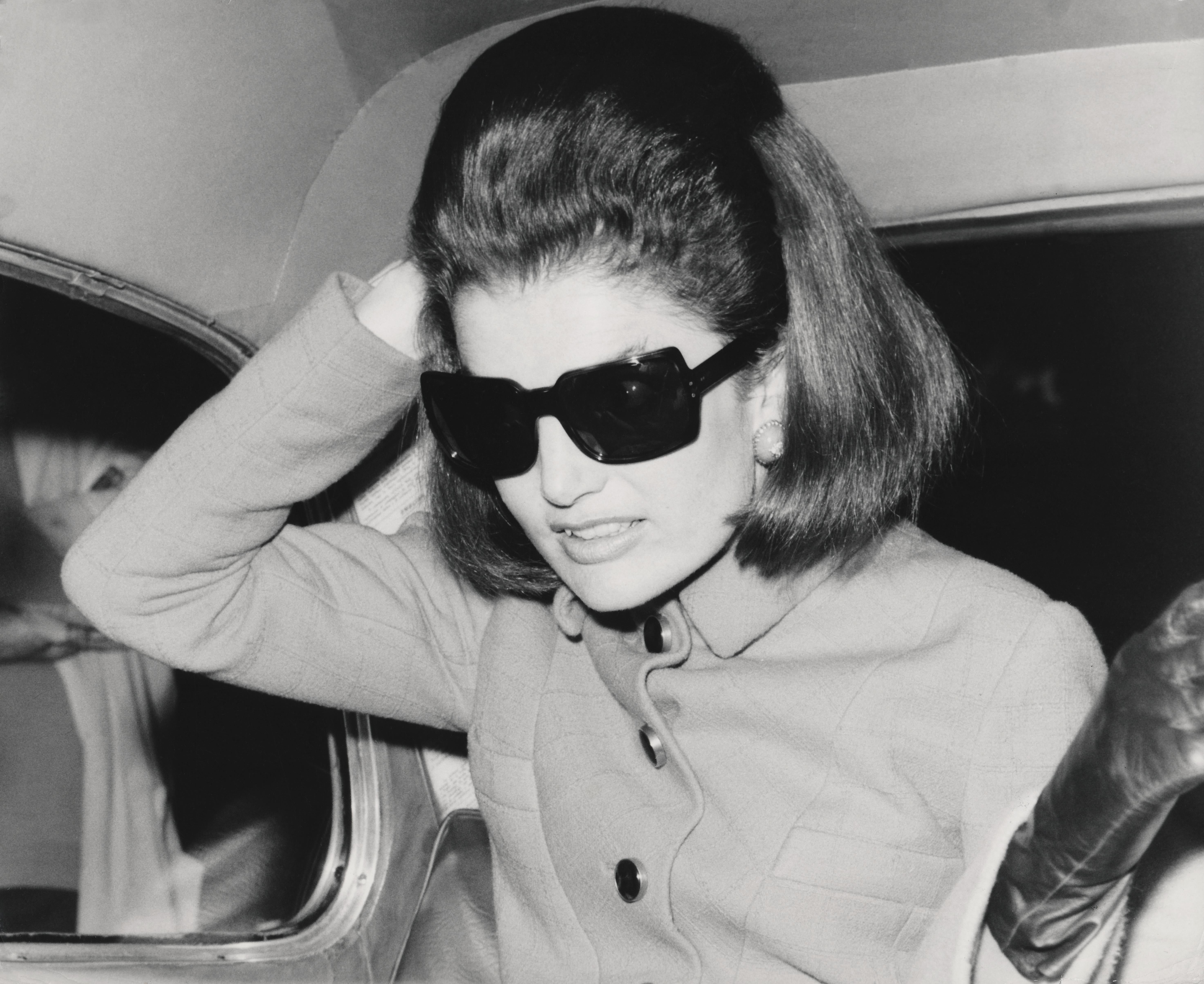 Unknown Portrait Photograph - Jackie Kennedy: Sunglasses at Night Globe Photos Fine Art Print