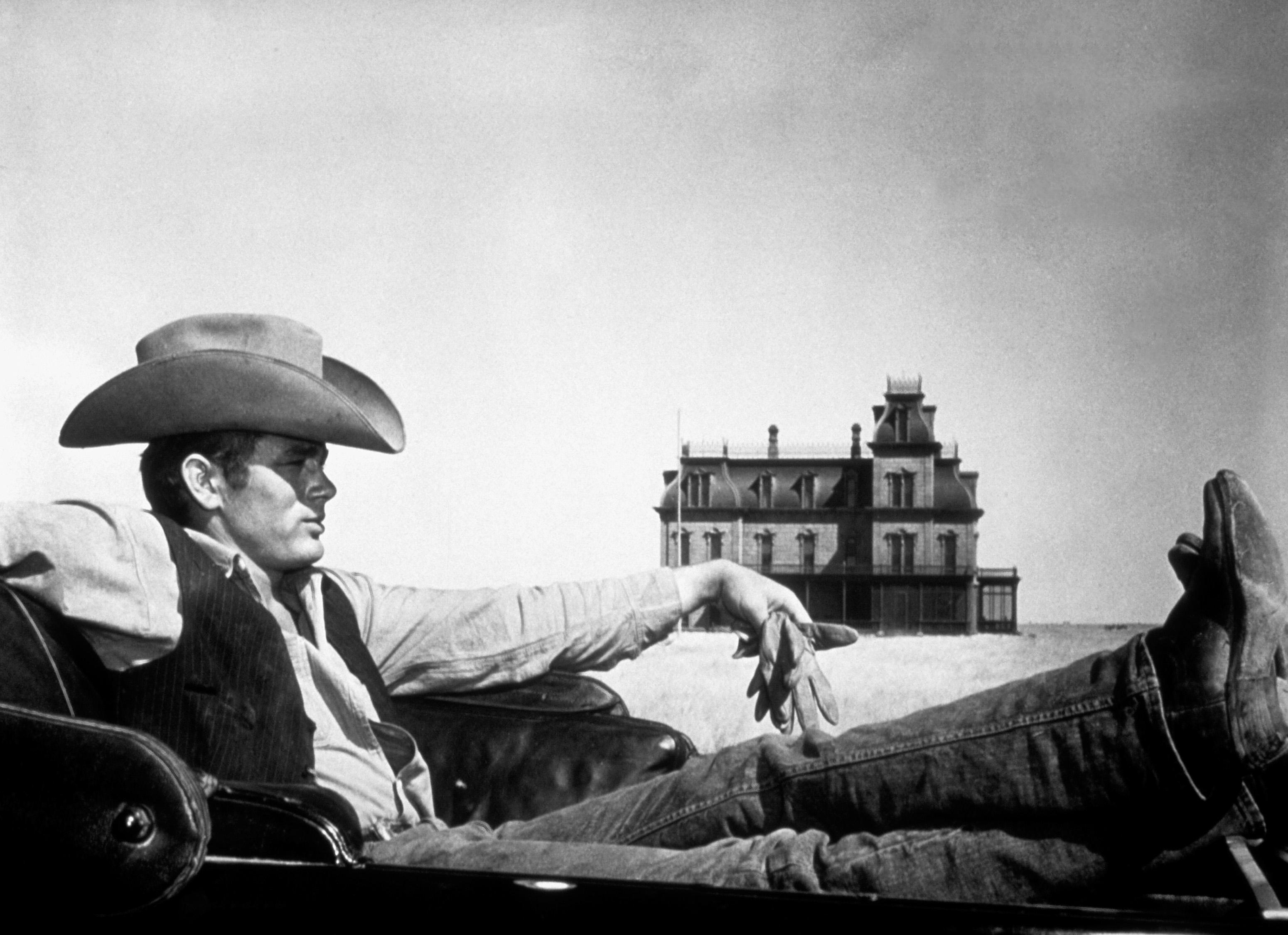 Unknown Black and White Photograph - James Dean Reclining in Giant Globe Photos Fine Art Print