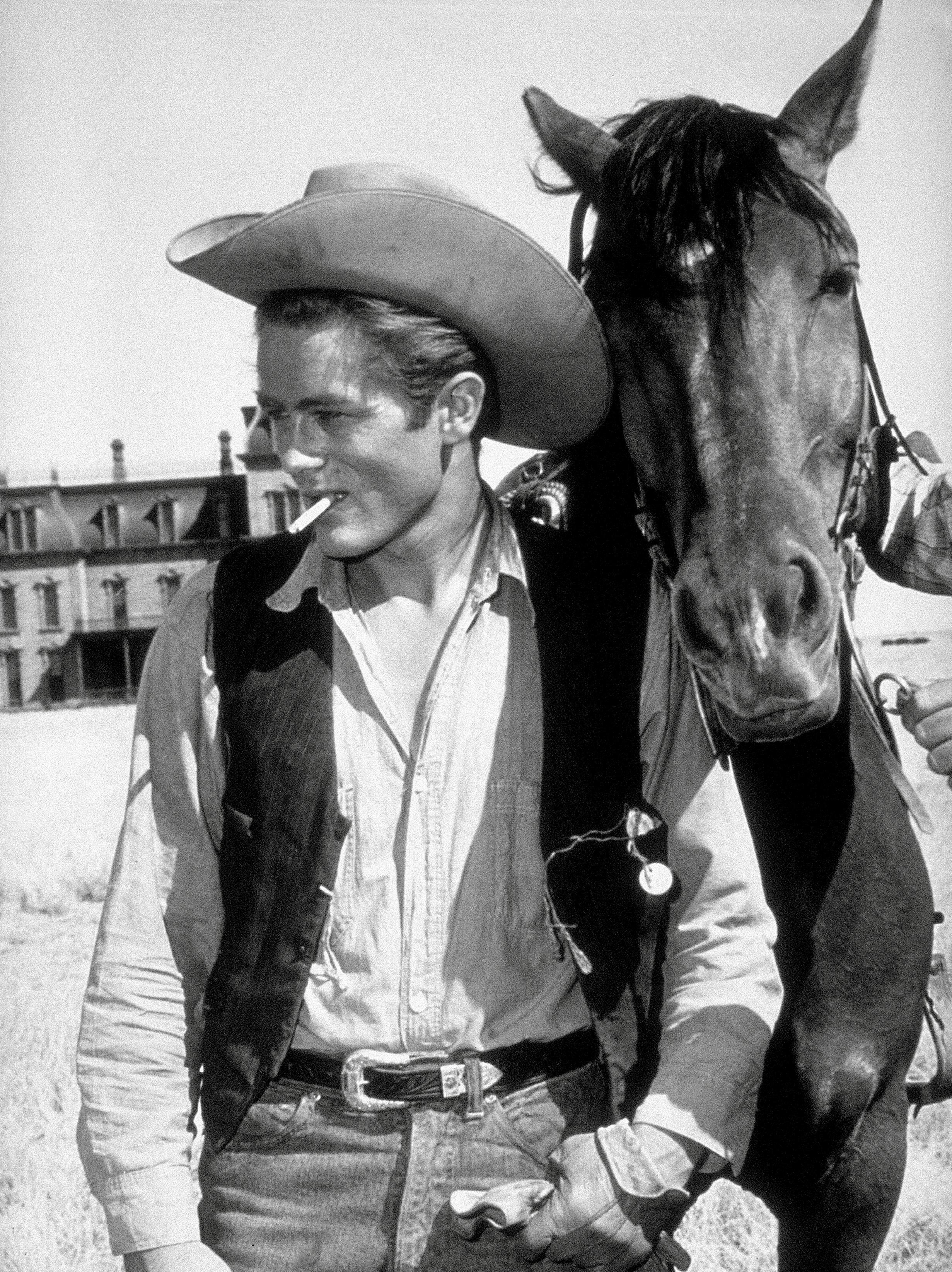 Unknown Portrait Photograph - James Dean with Horse in "Giant" Globe Photos Fine Art Print