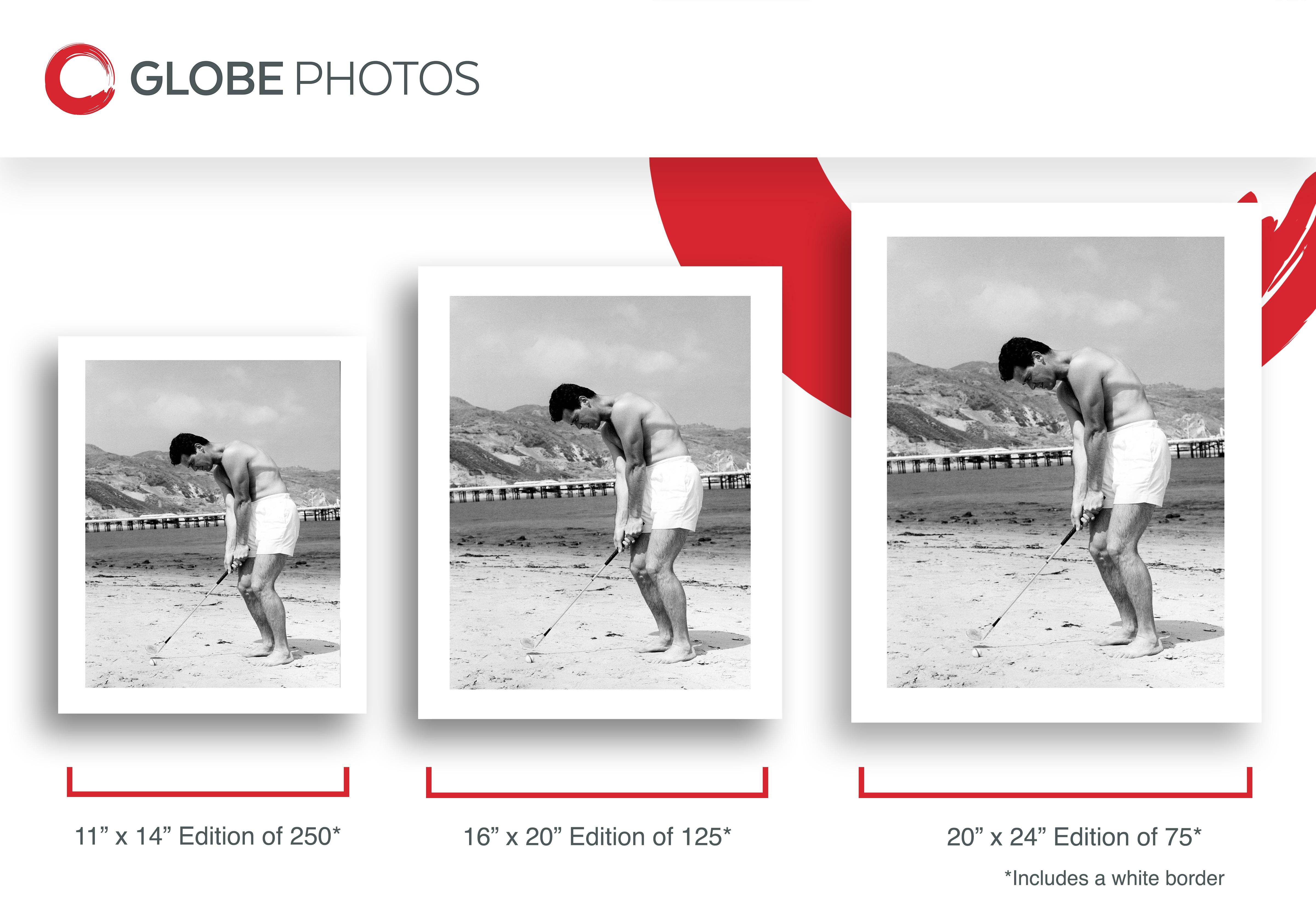 James Garner Playing Golf on the Beach - Gray Portrait Photograph by Unknown