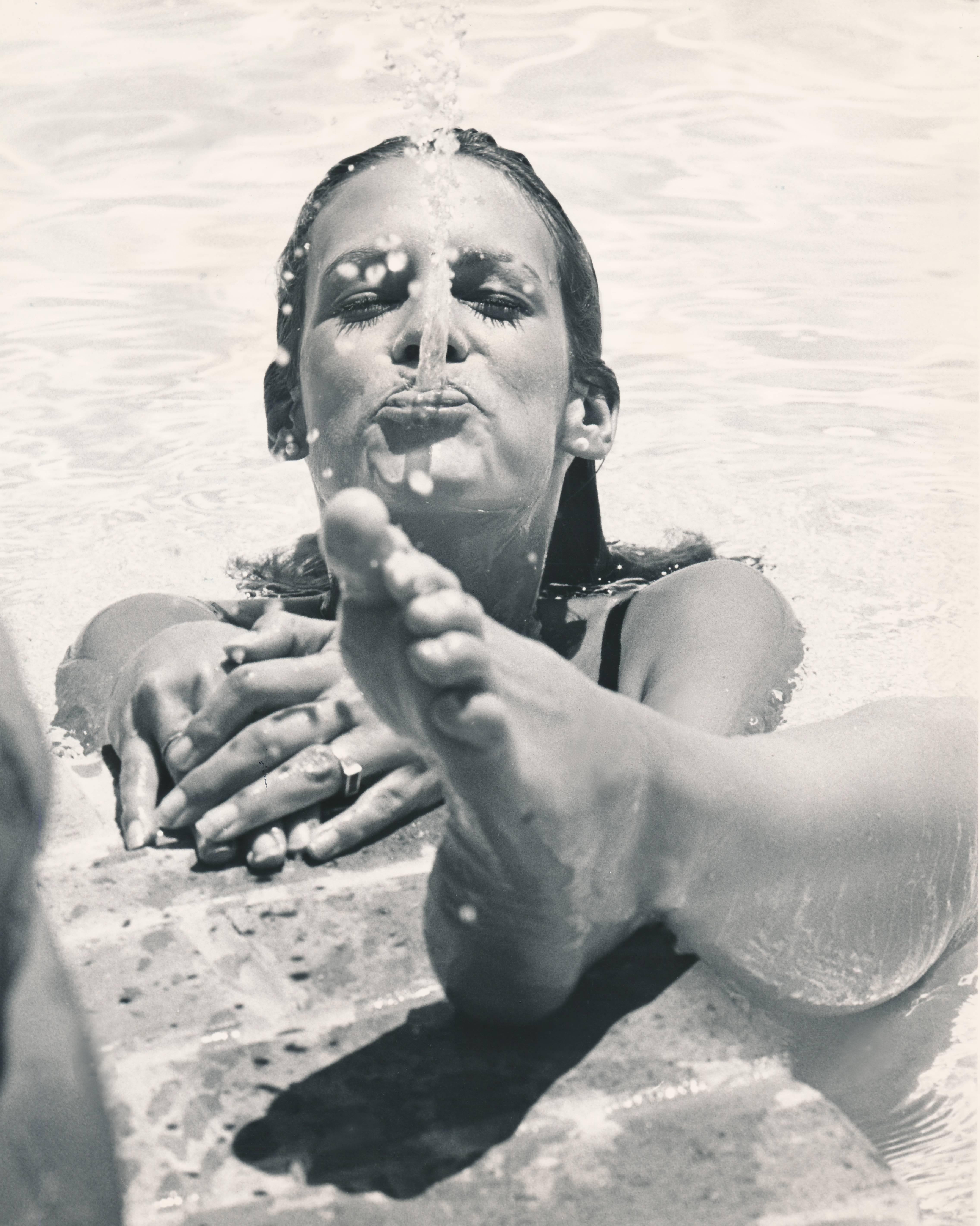 Unknown Portrait Photograph - Jamie Lee Curtis Spitting in Pool Fine Art Print