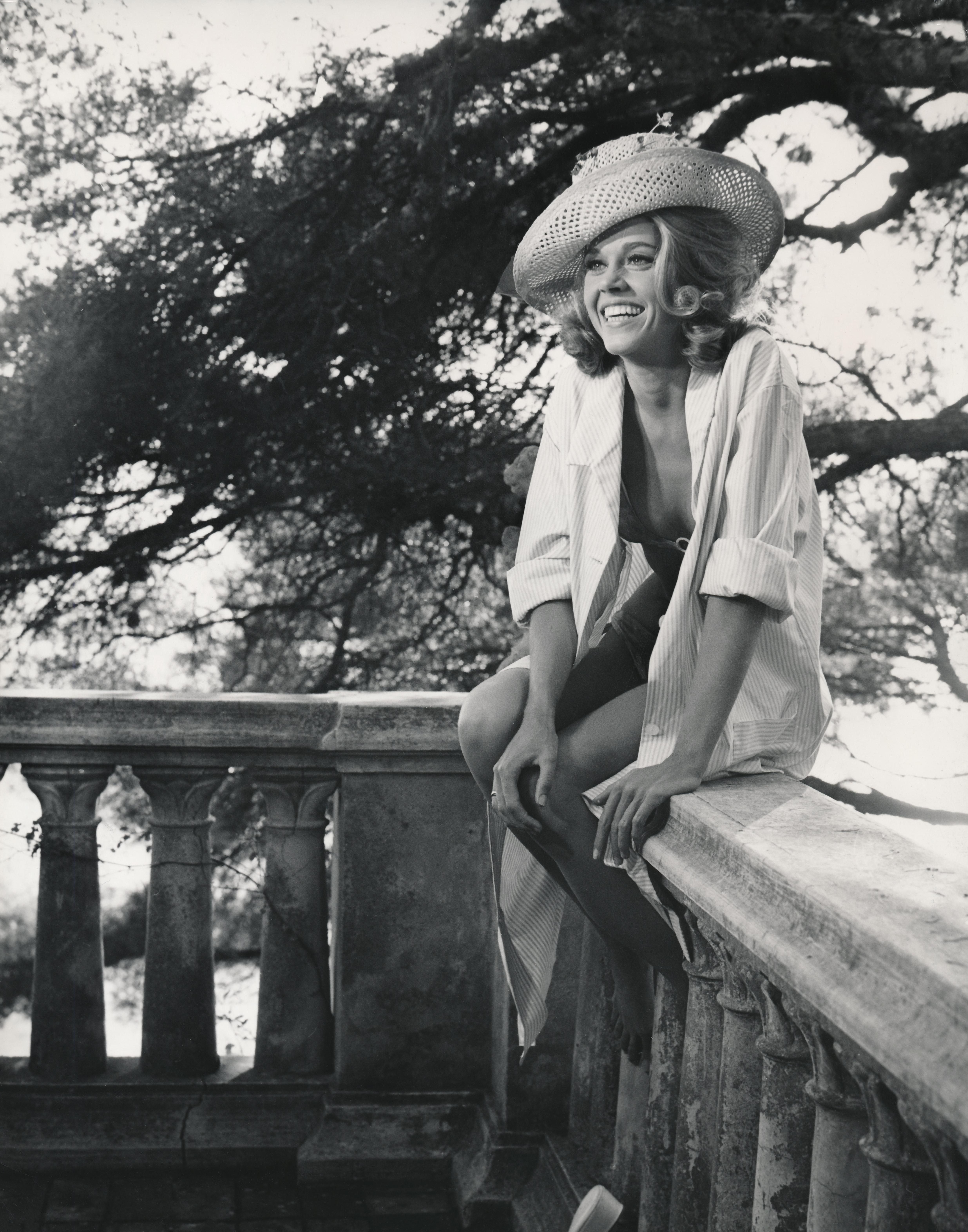 Unknown Black and White Photograph - Jane Fonda Laughing in Sun Hat Fine Art Print