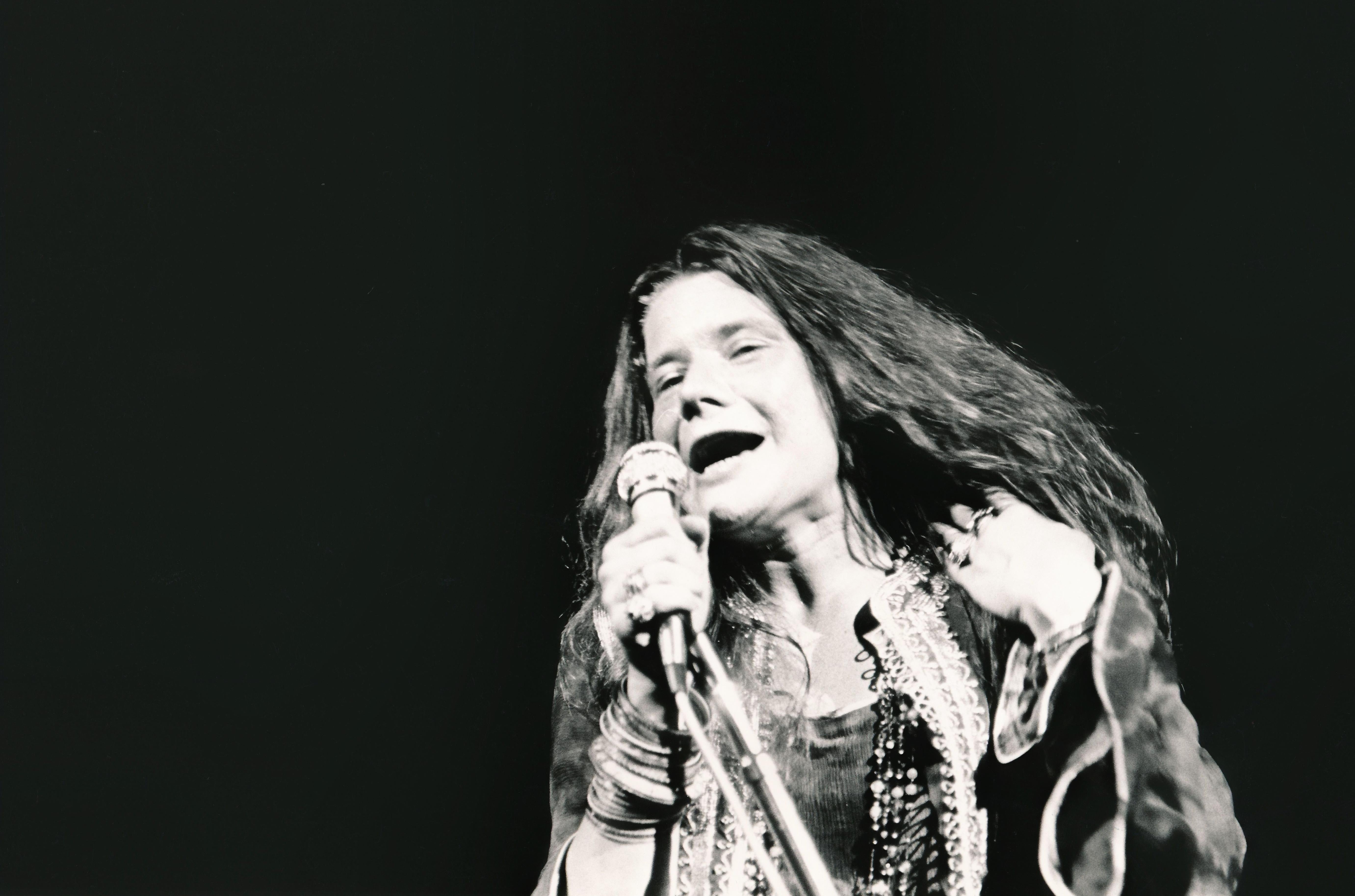 Unknown Black and White Photograph - Janis Joplin Singing at Woodstock Globe Photos Fine Art Print