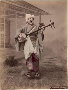 Antique Japan, Girl with Samisen or Gozenobo, titled Beggar (Gozenobo)
