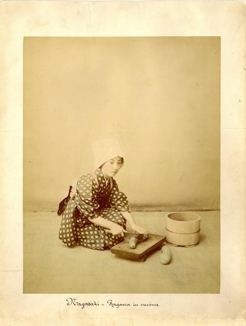 Unknown Black and White Photograph - Japanese Woman Cooking by Shin E Do - Hand-Colored Albumen Print 1870/1890