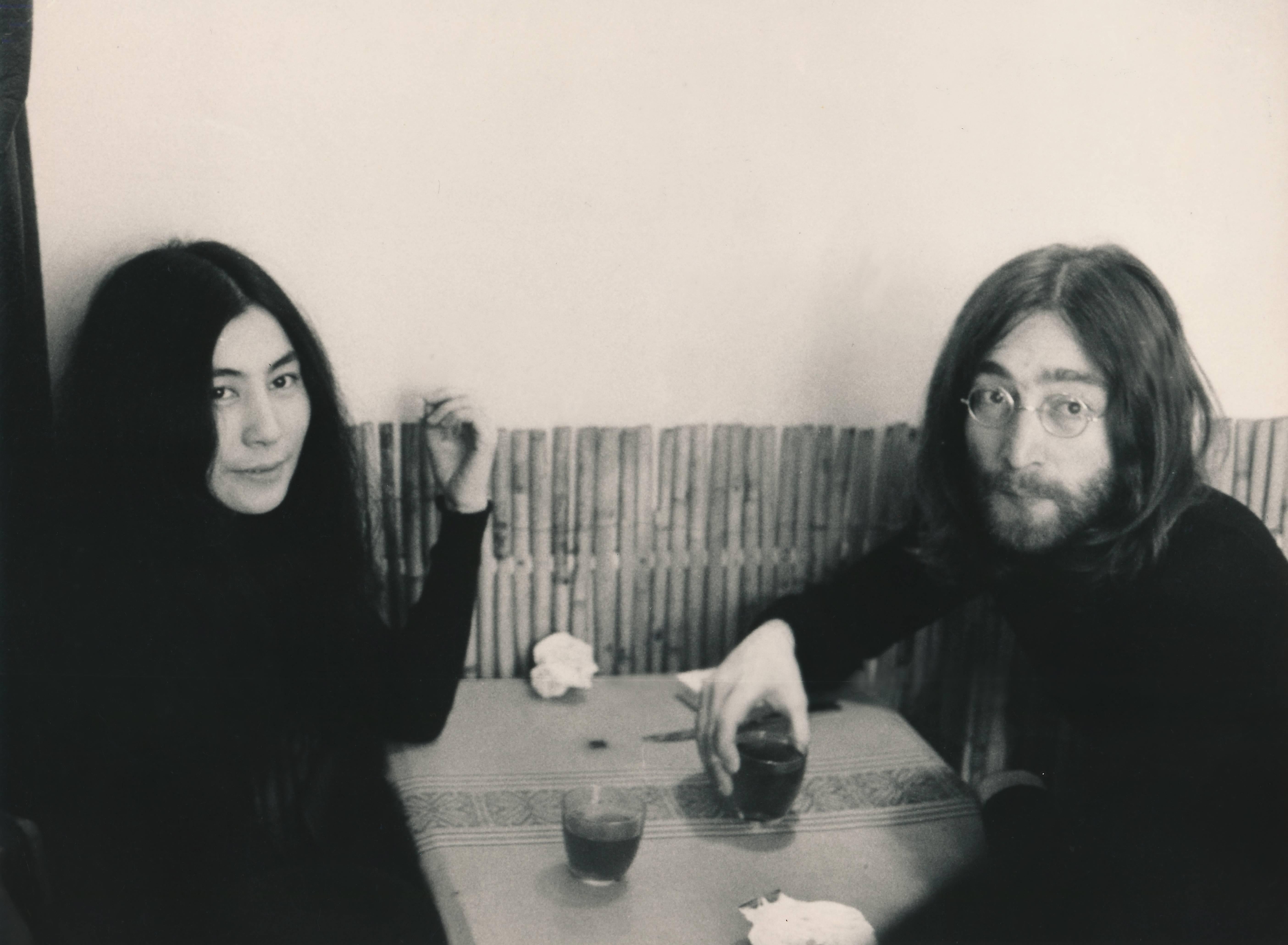 Unknown Black and White Photograph - John Lennon and Yoko Ono Sitting Together Fine Art Print