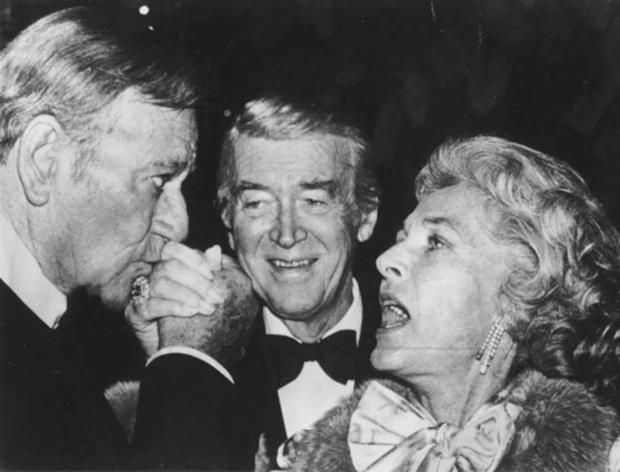 Unknown Figurative Photograph - John Wayne, James Stuart e Lauren Bacall - Vintage Photo - 1978