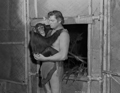 Johnny Weissmuller Holding a Monkey Fine Art Print