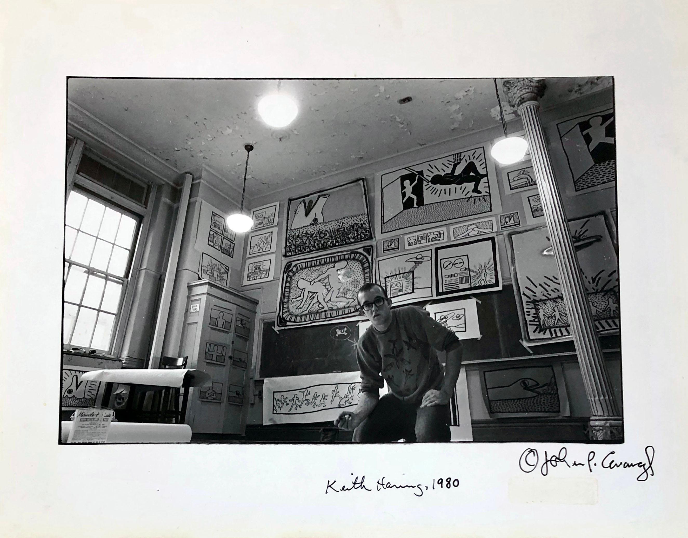Keith Haring at P.S. 122 (photo of Keith Haring in his studio) - Photograph by Unknown