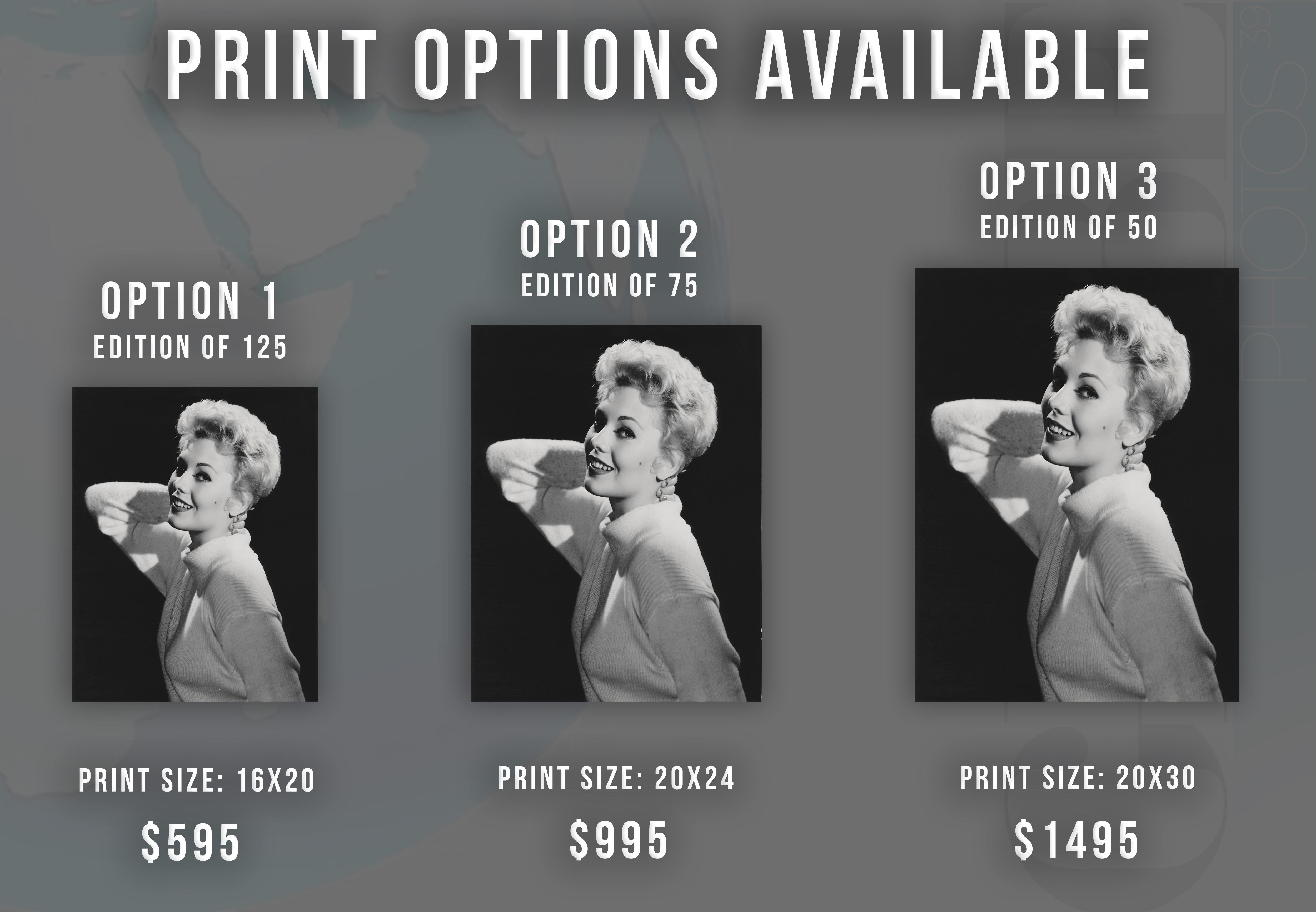 Kim Novak Smiling and Leaning Globe Photos Fine Art Print - Photograph by Unknown