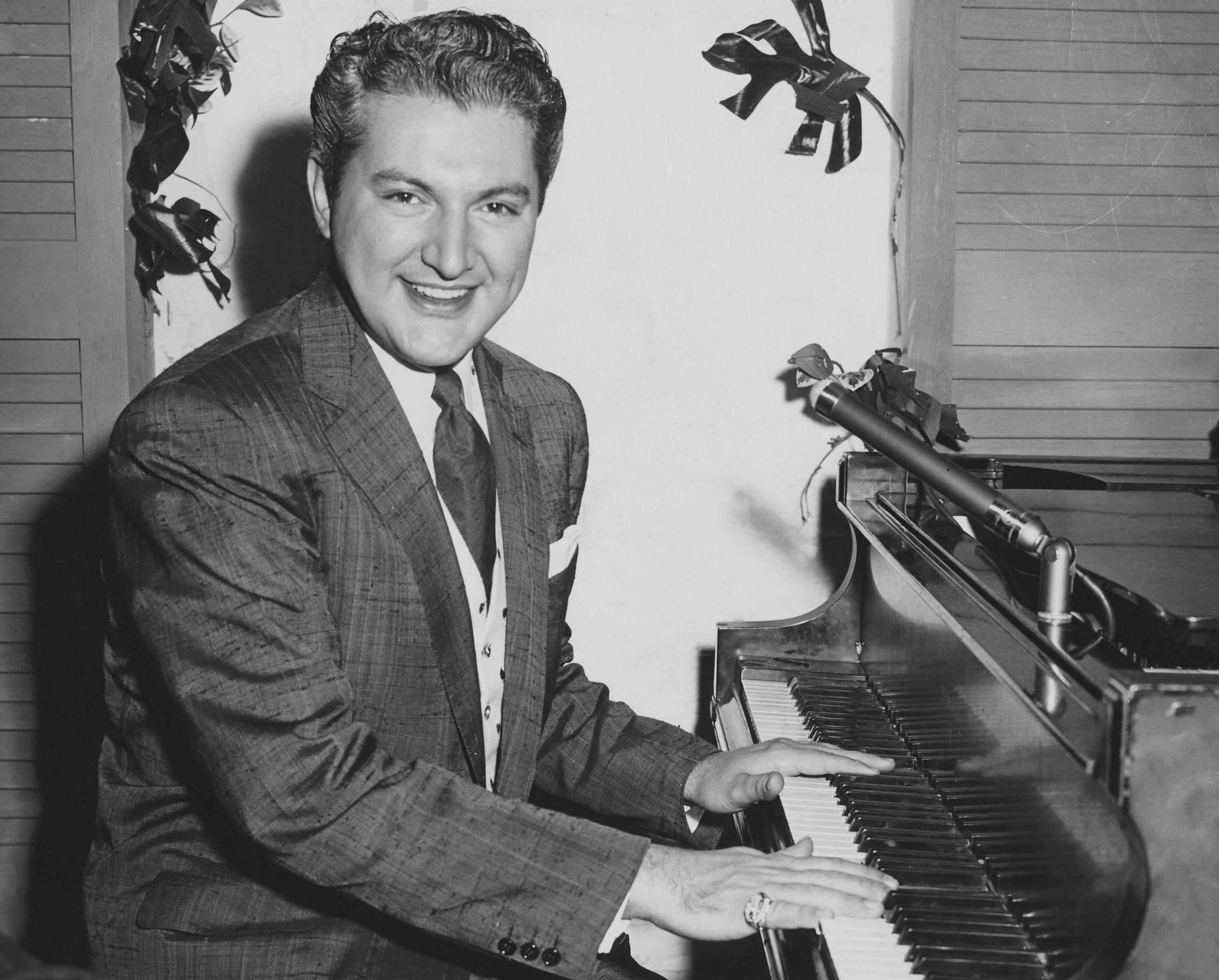 Unknown Black and White Photograph - Liberace Smiling at Piano Fine Art Print