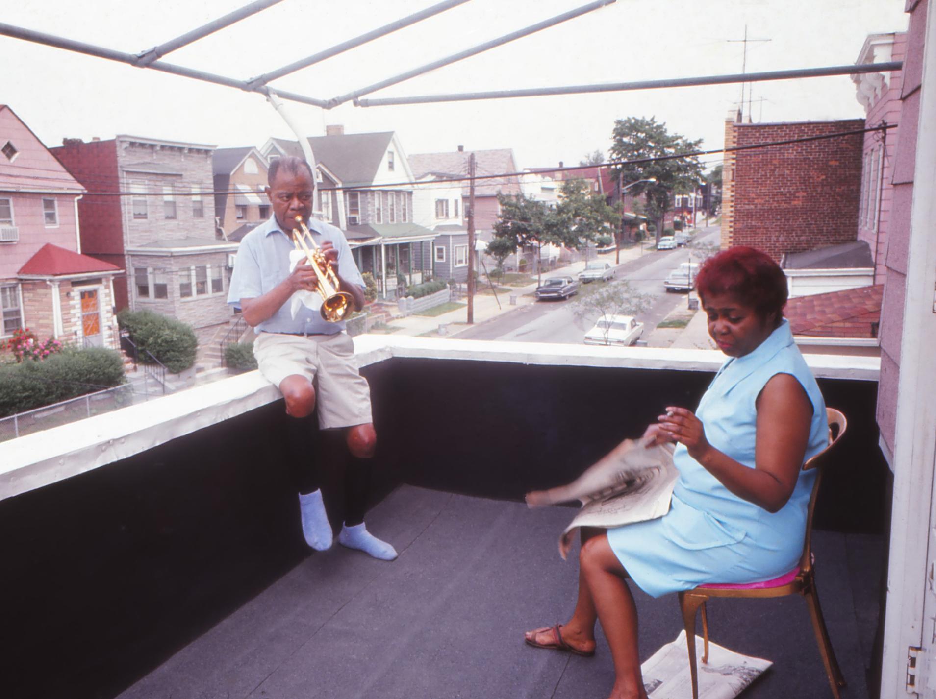 Unknown Portrait Photograph - Louis Armstrong Playing on Balcony