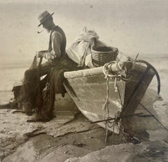 Man Smoking Pipe After Fishing