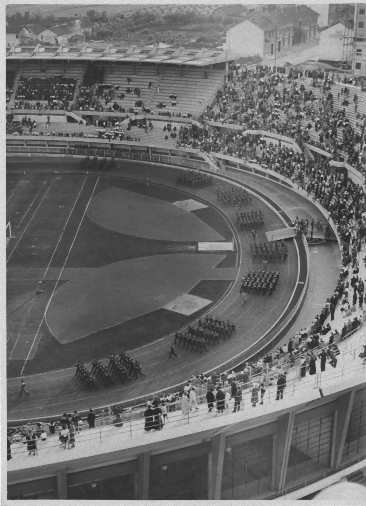 Unknown Figurative Photograph - March in the Municipal Stadium - Vintage b/w Photo - 1930s
