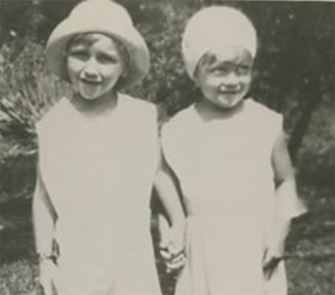  Marilyn Monroe as a Young child Holding Hands With a Friend - Photograph by Unknown