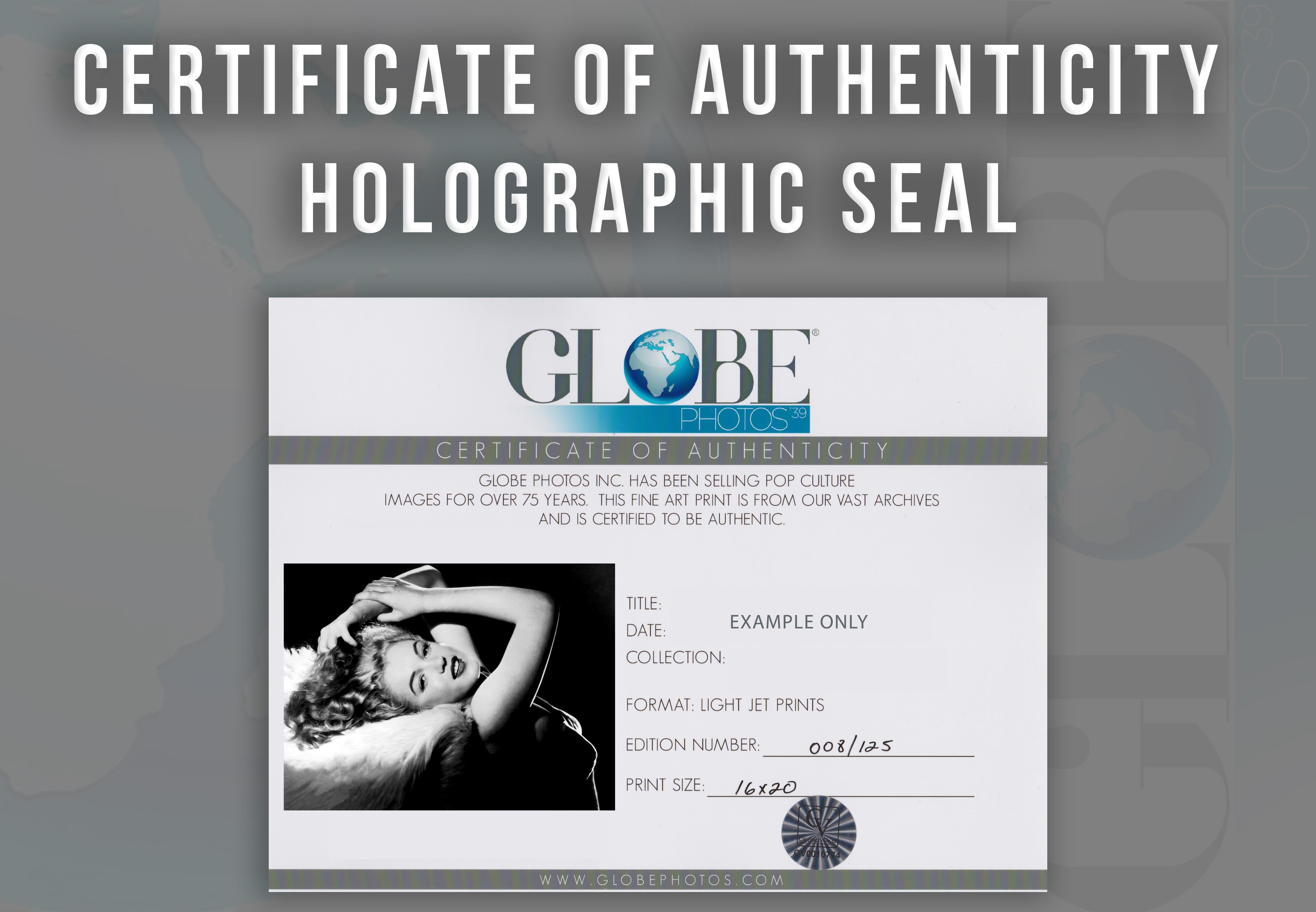 Marilyn Monroe: Elegance in the Studio Globe Photos Fine Art Print - Black Black and White Photograph by Unknown