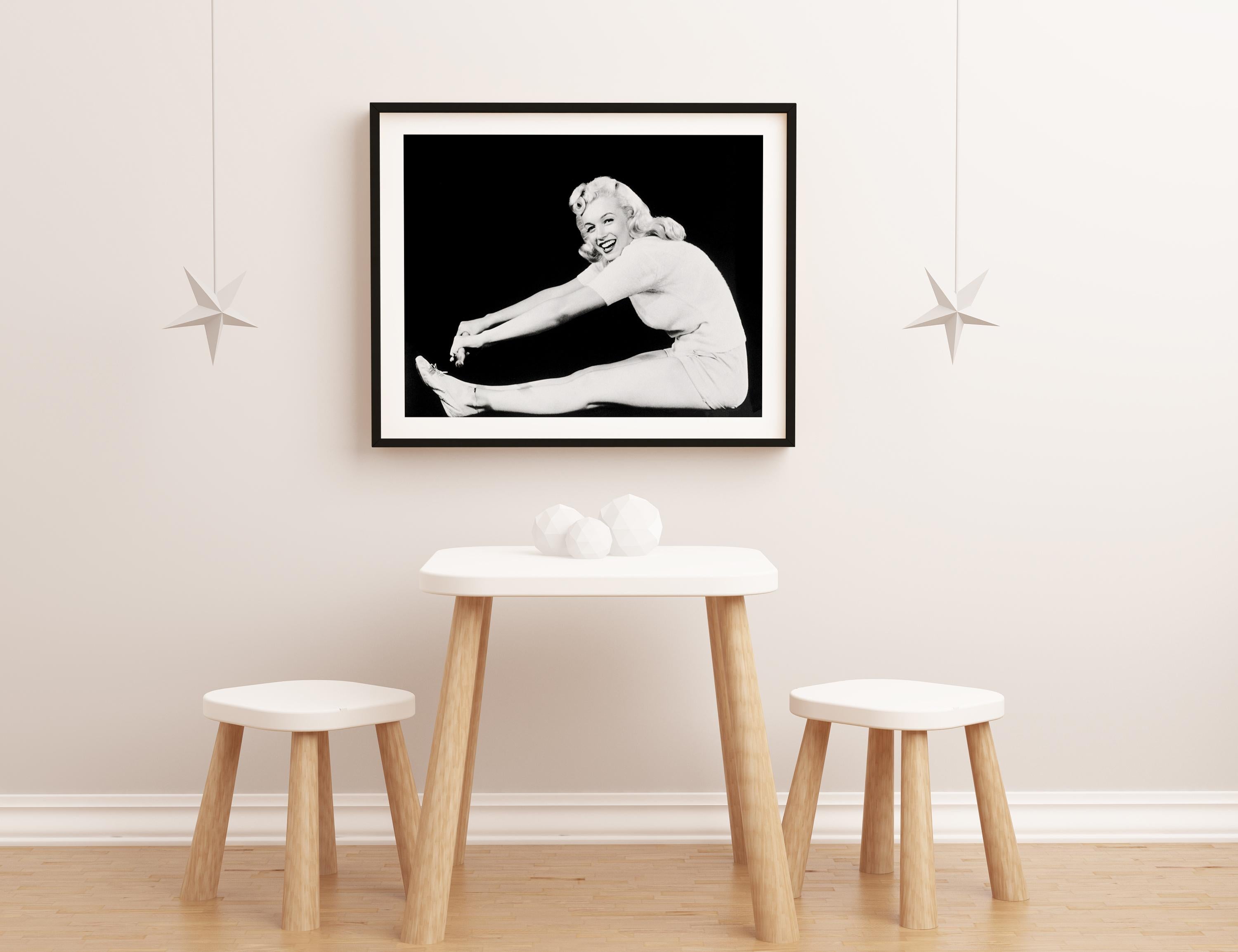 Marilyn Monroe Exercising and Smiling Globe Photos Fine Art Print For Sale 1