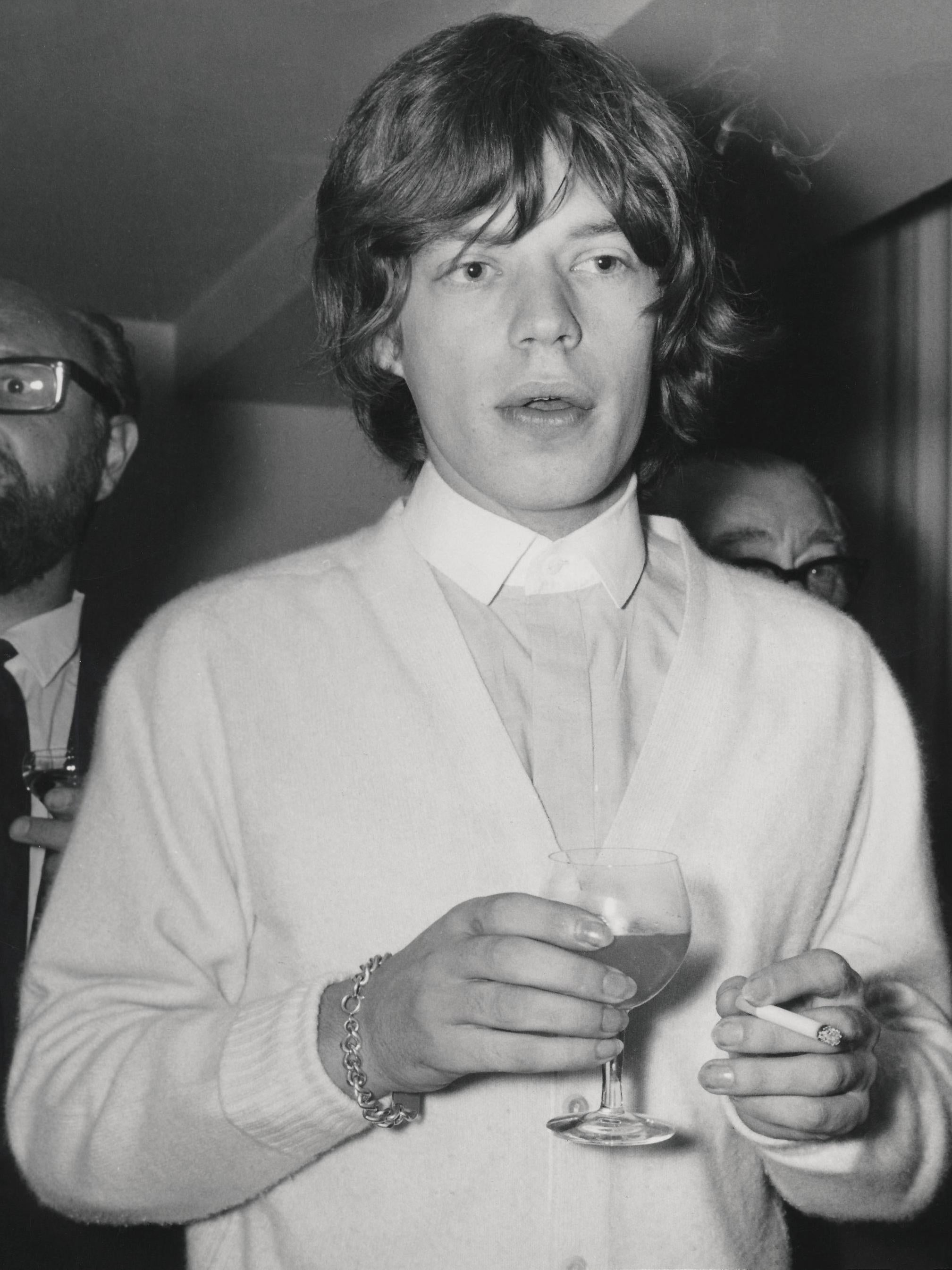 Unknown Portrait Photograph - Mick Jagger Candid at a Party Globe Photos Fine Art Print