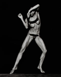 Photographie de l'artiste Mystery représentant une femme bodybuilder