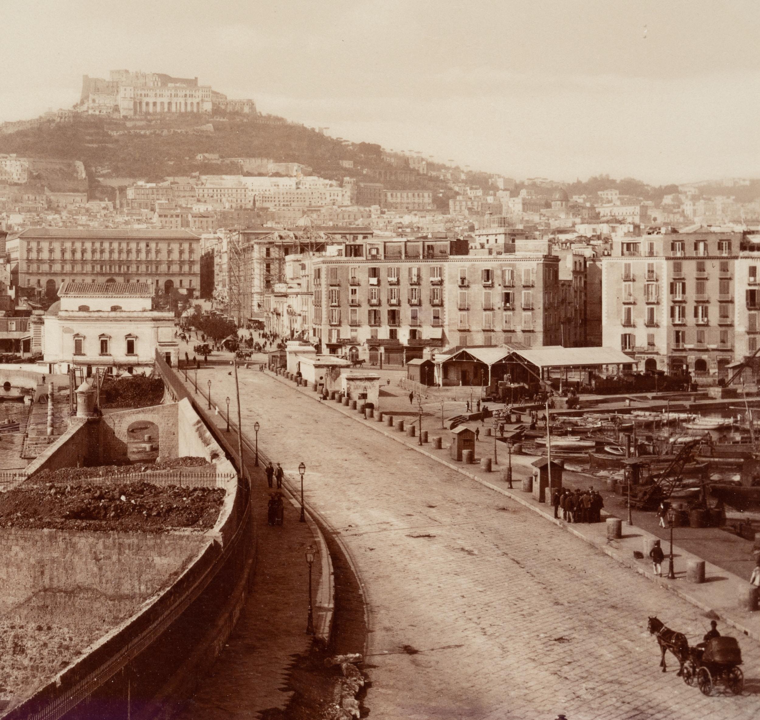 Fratelli Alinari (19th century): City view of Naples View from the harbour road, passing the Castel Nuovo on the left, up to the Vomero mountain and the Castel Sant' Elmo, c. 1880, albumen paper print

Technique: albumen paper print

Inscription: