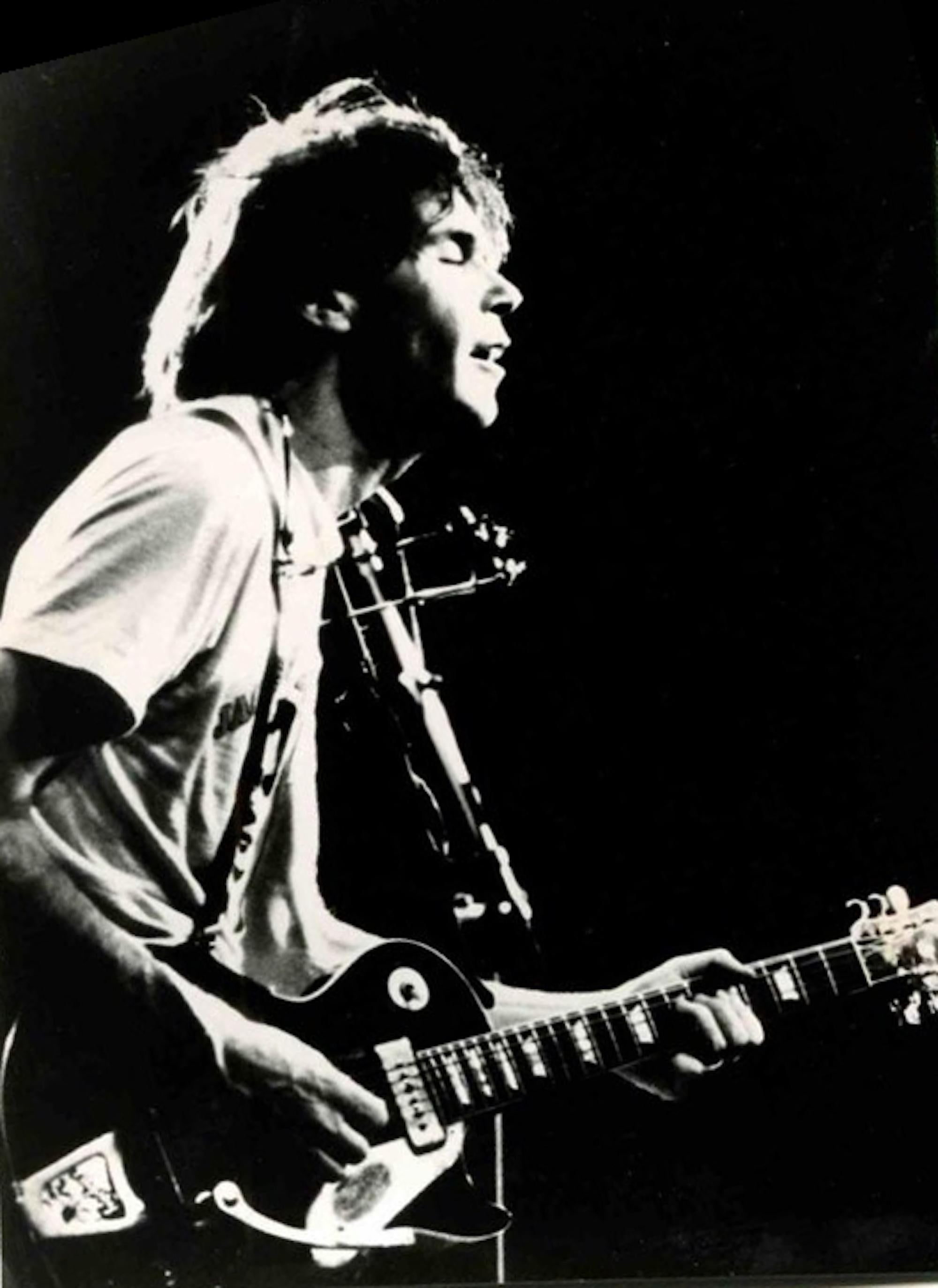Unknown Figurative Photograph - Neil Young in Concert - Photo - 1980s
