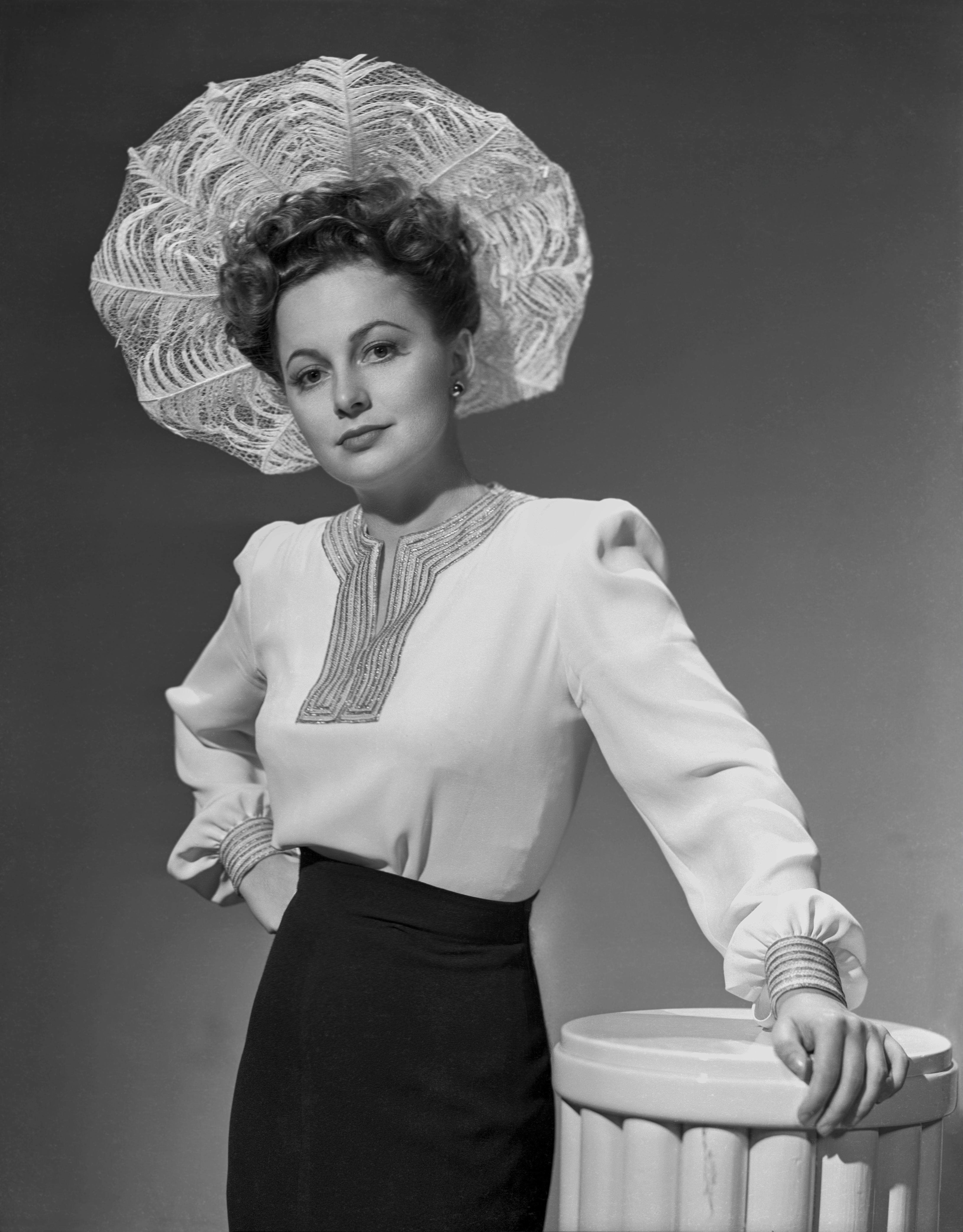 Unknown Black and White Photograph - Olivia de Havilland in Brimmed Hat Movie Star News Fine Art Print