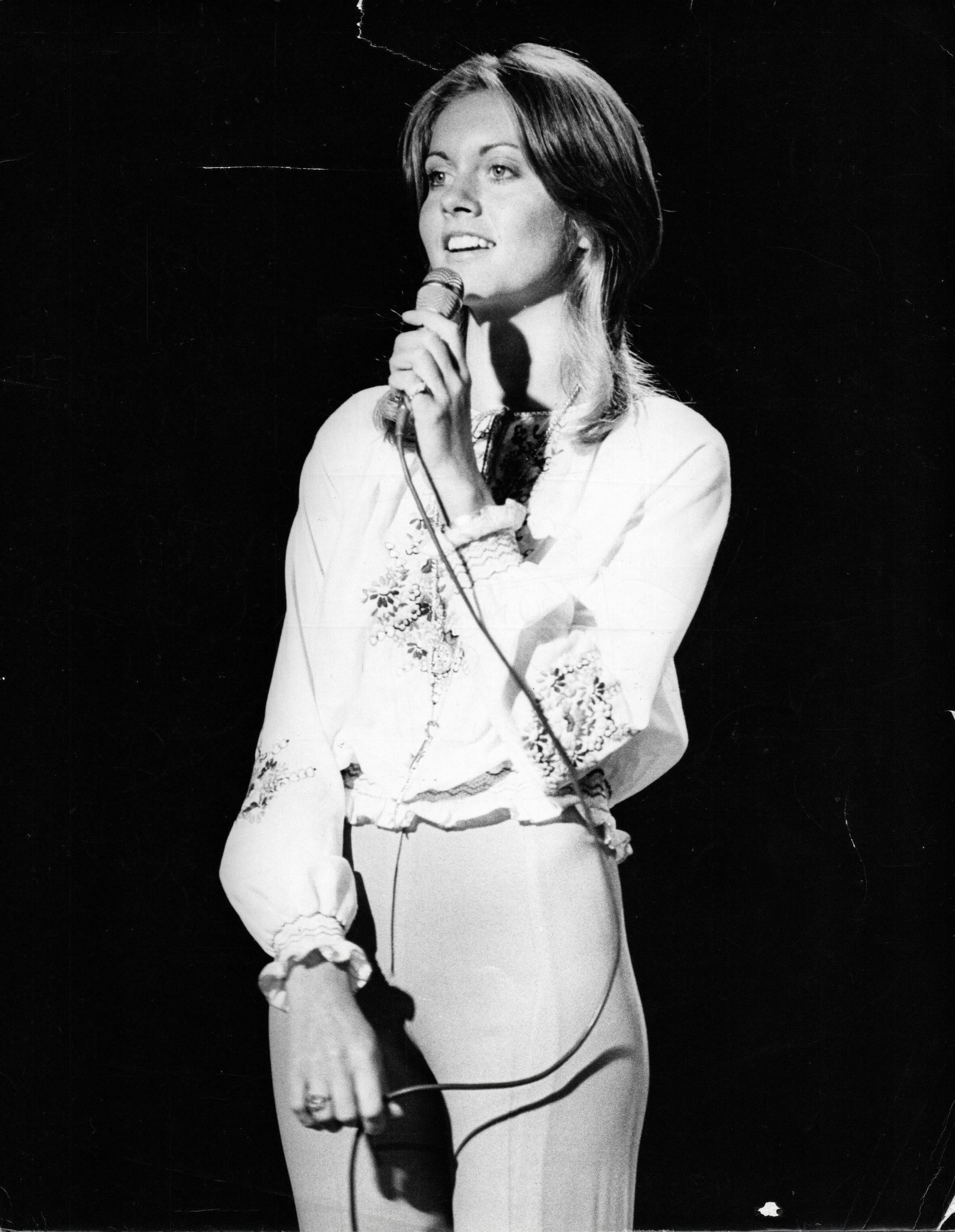 Unknown Black and White Photograph - Olivia Newton John with Microphone Vintage Original Photograph