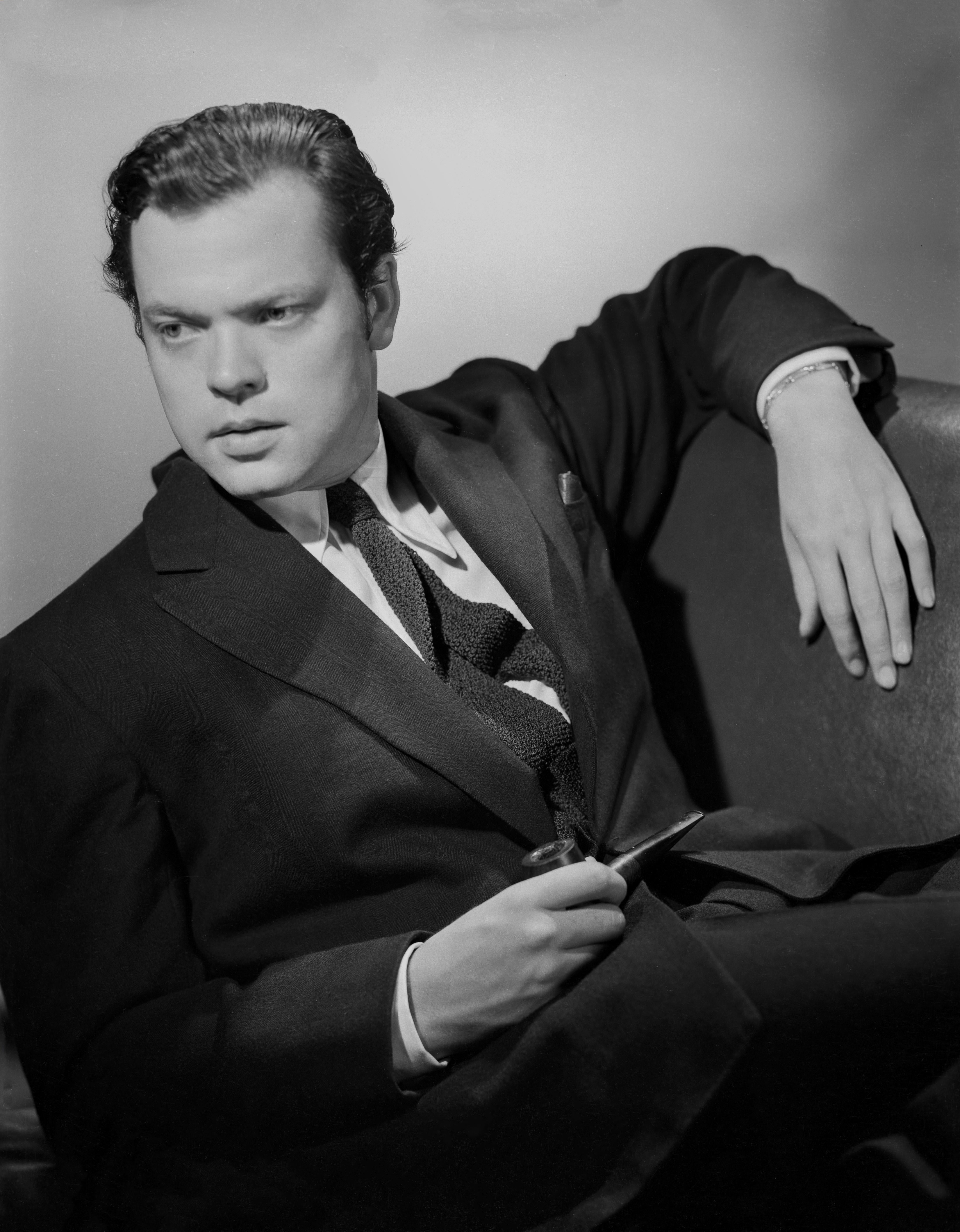 Unknown Portrait Photograph - Orson Welles Leaning in the Studio Movie Star News Fine Art Print