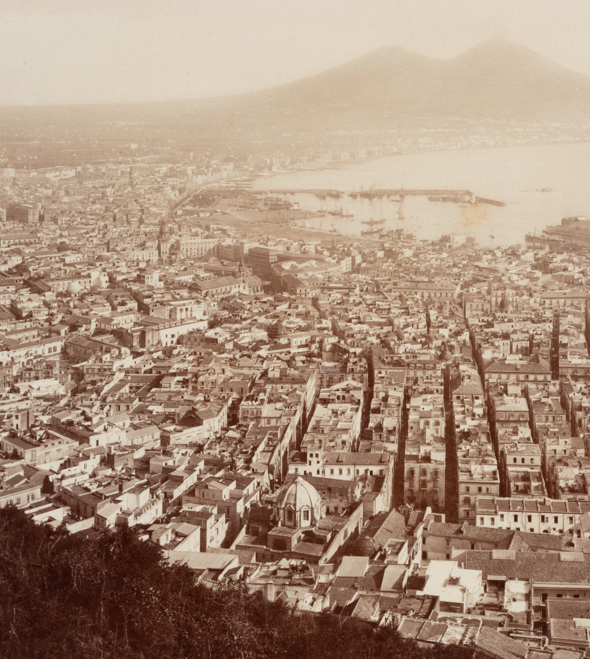 Fratelli Alinari (19th century): Panoramic view from San Martino of the city of Naples, the coast and Visuv in the distance, c. 1880, albumen paper print

Technique: albumen paper print

Inscription: Lower middle signed in the printing plate: 