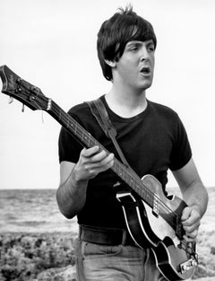 Paul McCartney Playing on Beach for "Help!" Globe Photos Fine Art Print