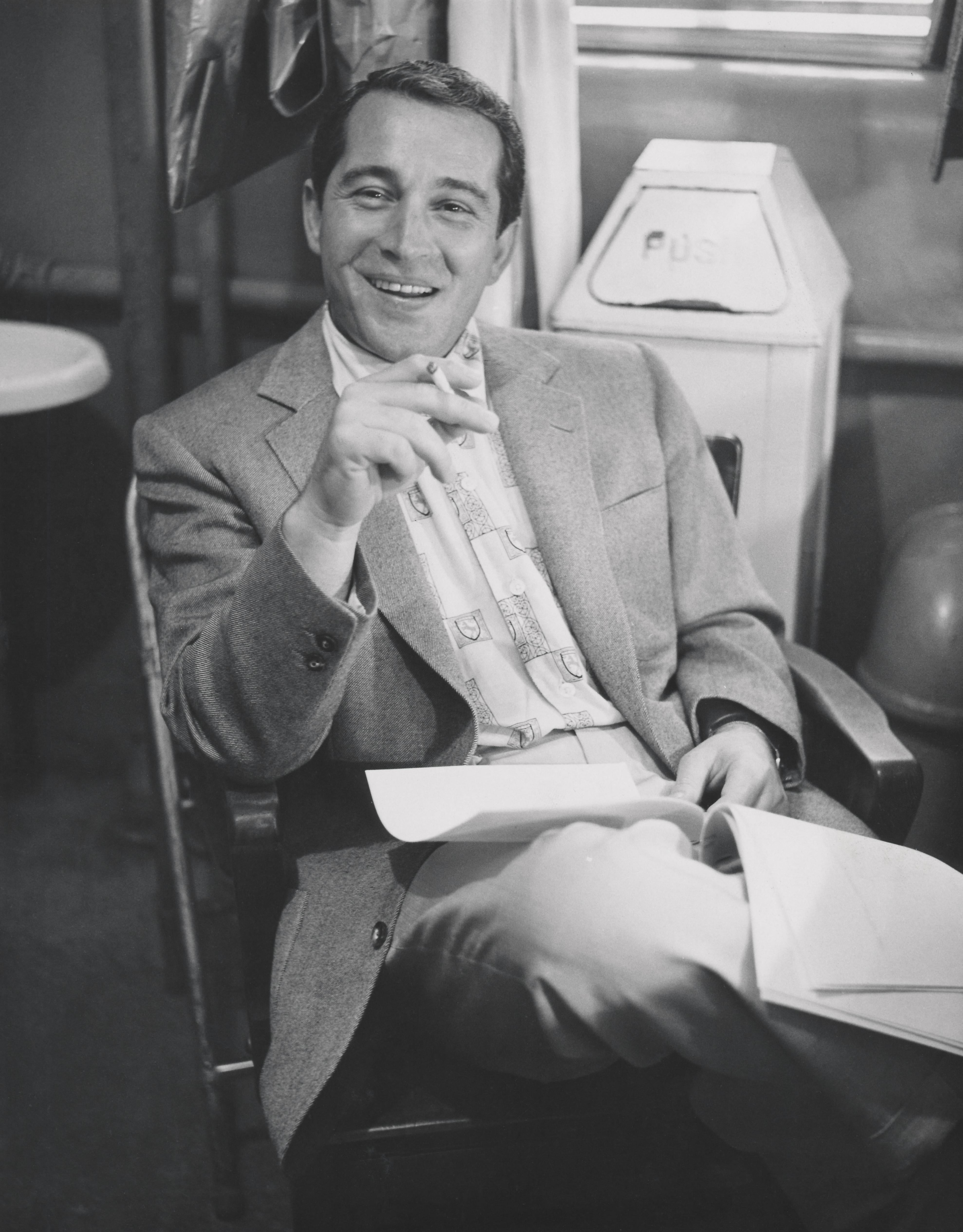 Unknown Black and White Photograph - Perry Como Smiling and Smoking Fine Art Print
