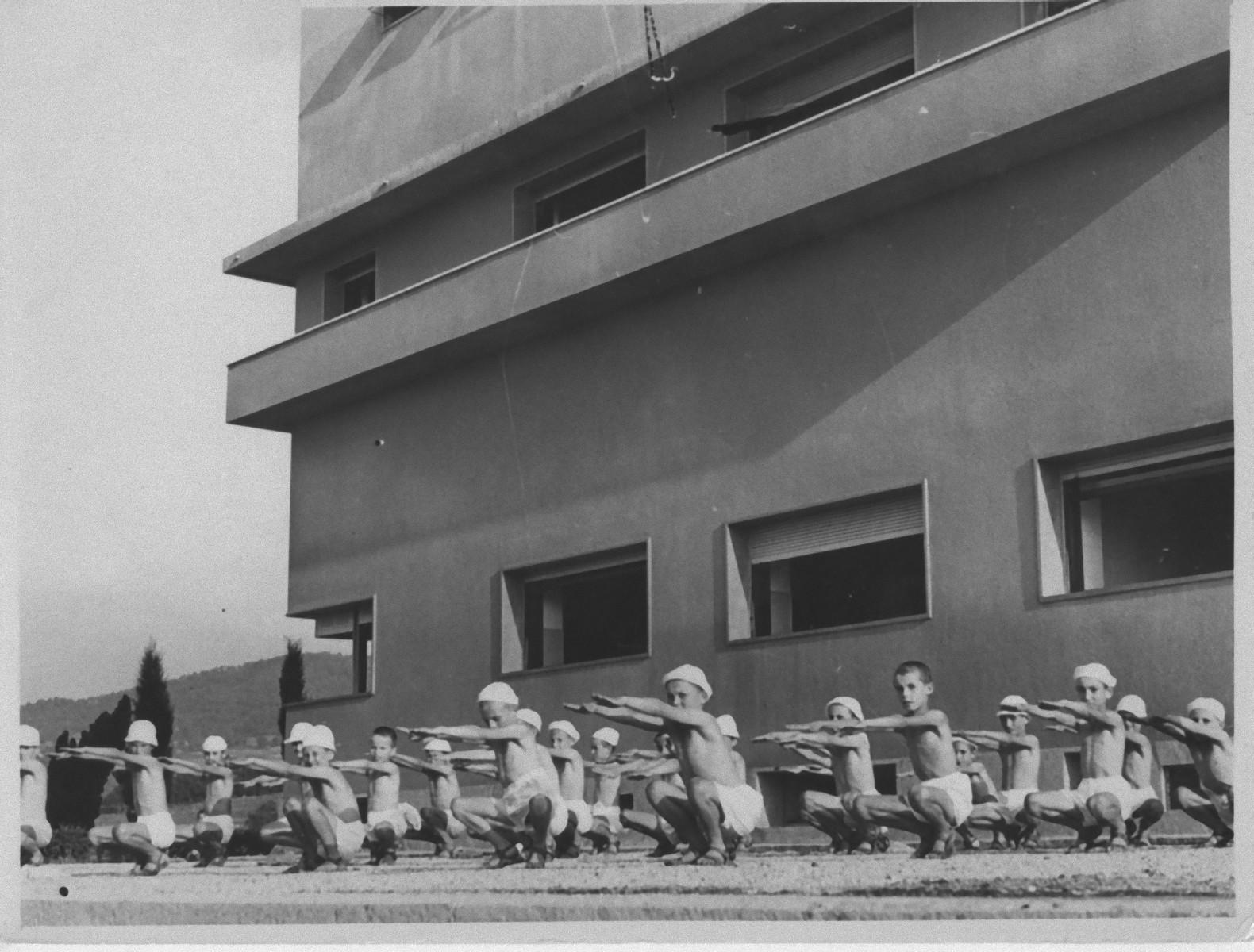 Unknown Figurative Photograph - Physical Education in a Primary School during Fascist Period in Italy- 1930 c.a.
