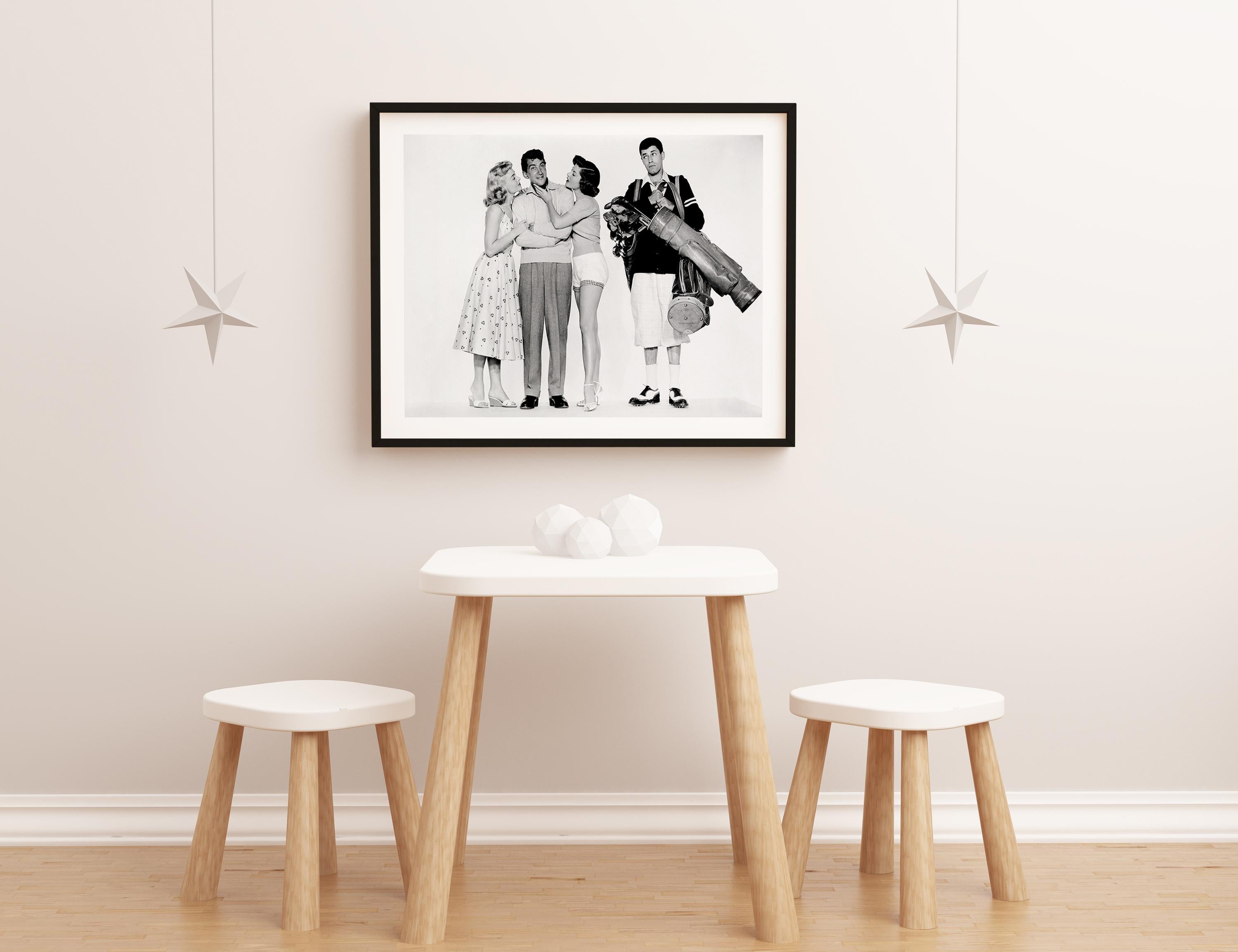 This black and white publicity still features Donna Reed, Dean Martin, Barbara Bates, and Jerry Lewis posed for their roles in 