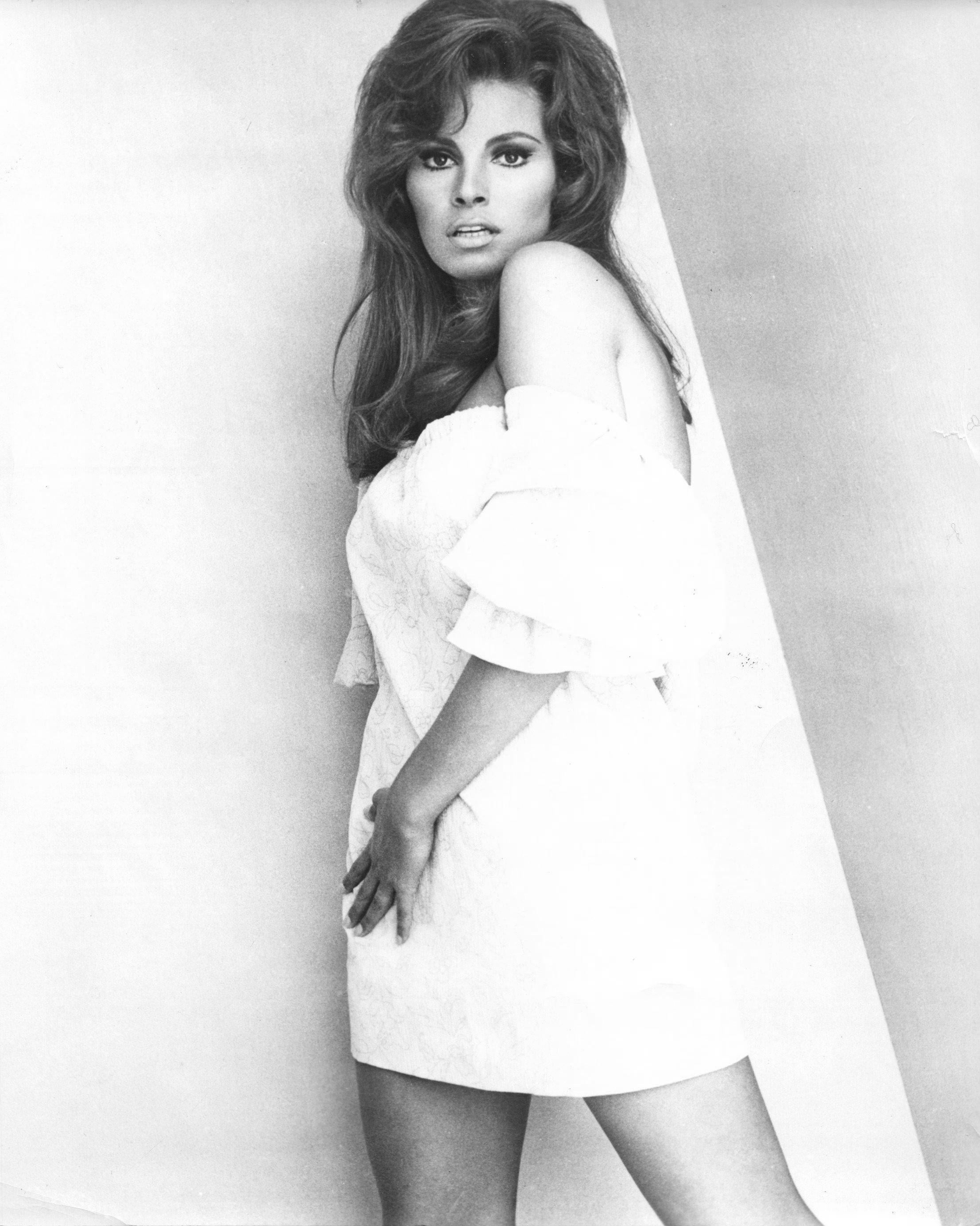 Unknown Black and White Photograph - Raquel Welch Pinup in White Mini Dress Vintage Original Photograph