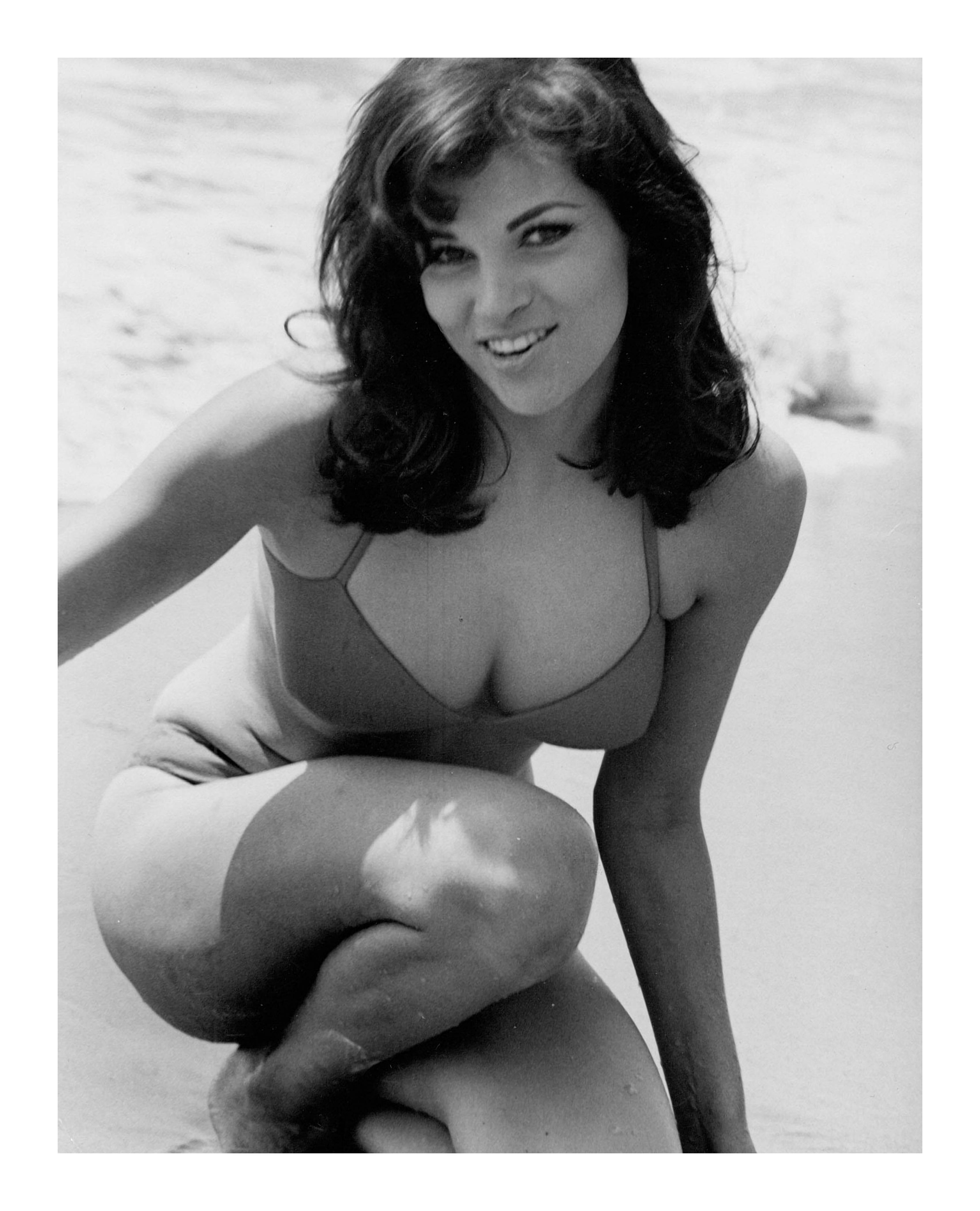 Raquel Welch Posed on Beach - Contemporary Photograph by Unknown