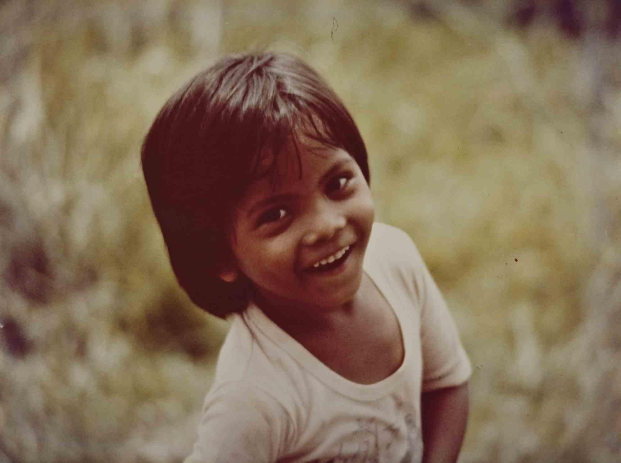 Figurative Photograph de Unknown - Reportaje desde Vietnam - El Niño - Foto de época - Años 70