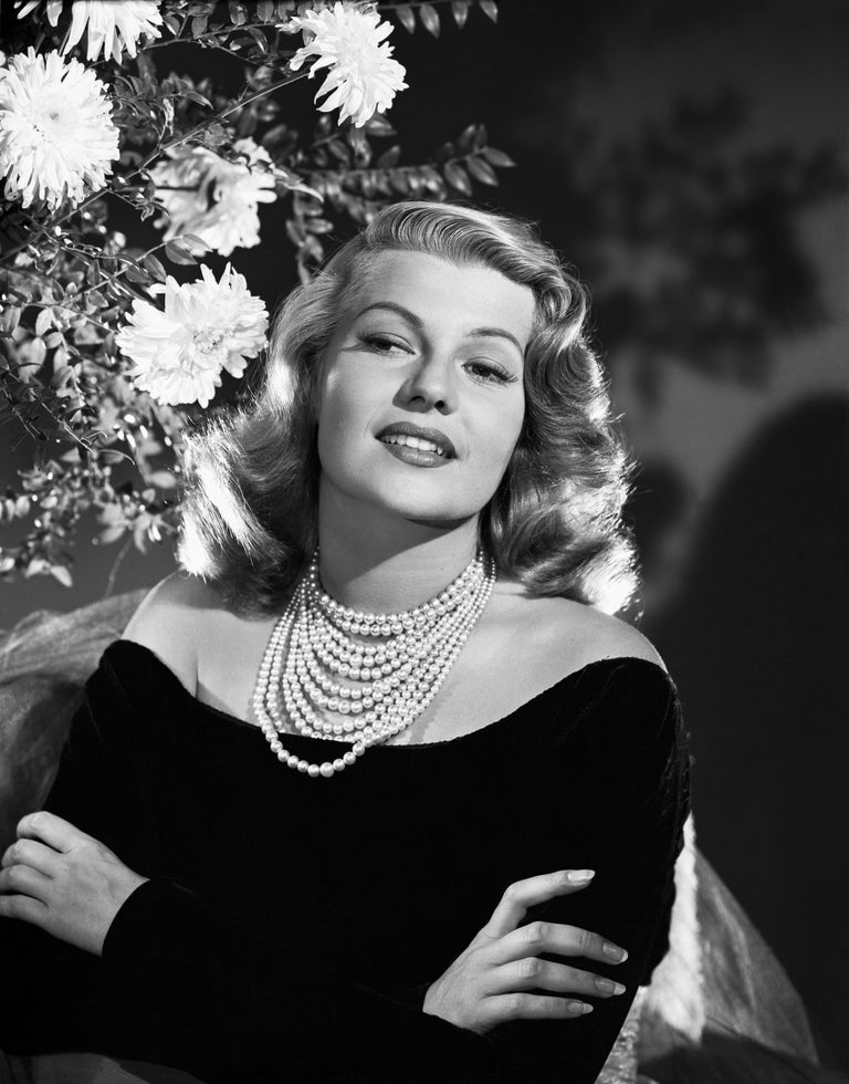 unknown rita hayworth smiling with ams crossed movie star news fine unknown rita hayworth smiling with ams crossed movie star news fine