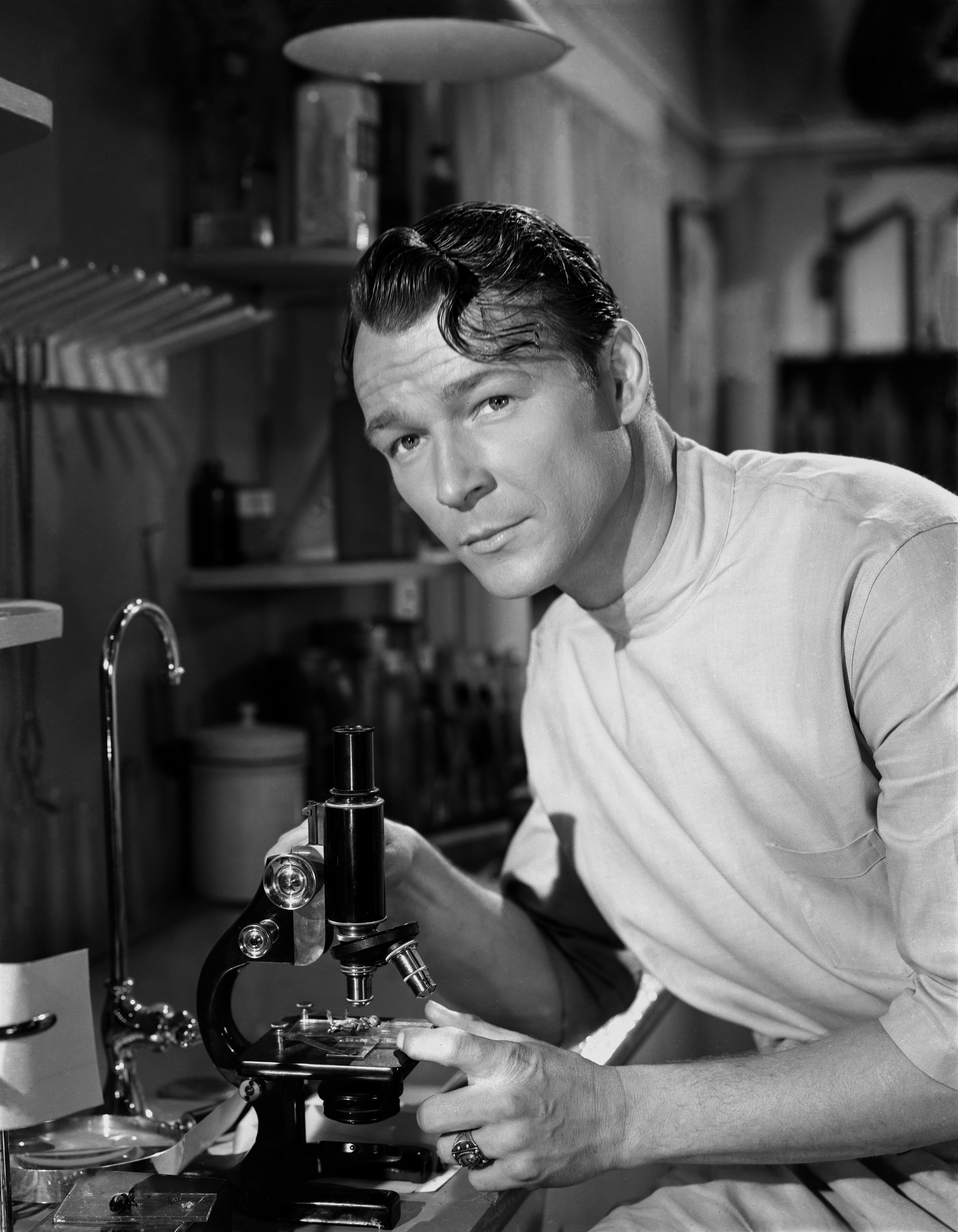 Unknown Portrait Photograph - Roy Rogers Posed with Microscope Movie Star News Fine Art Print