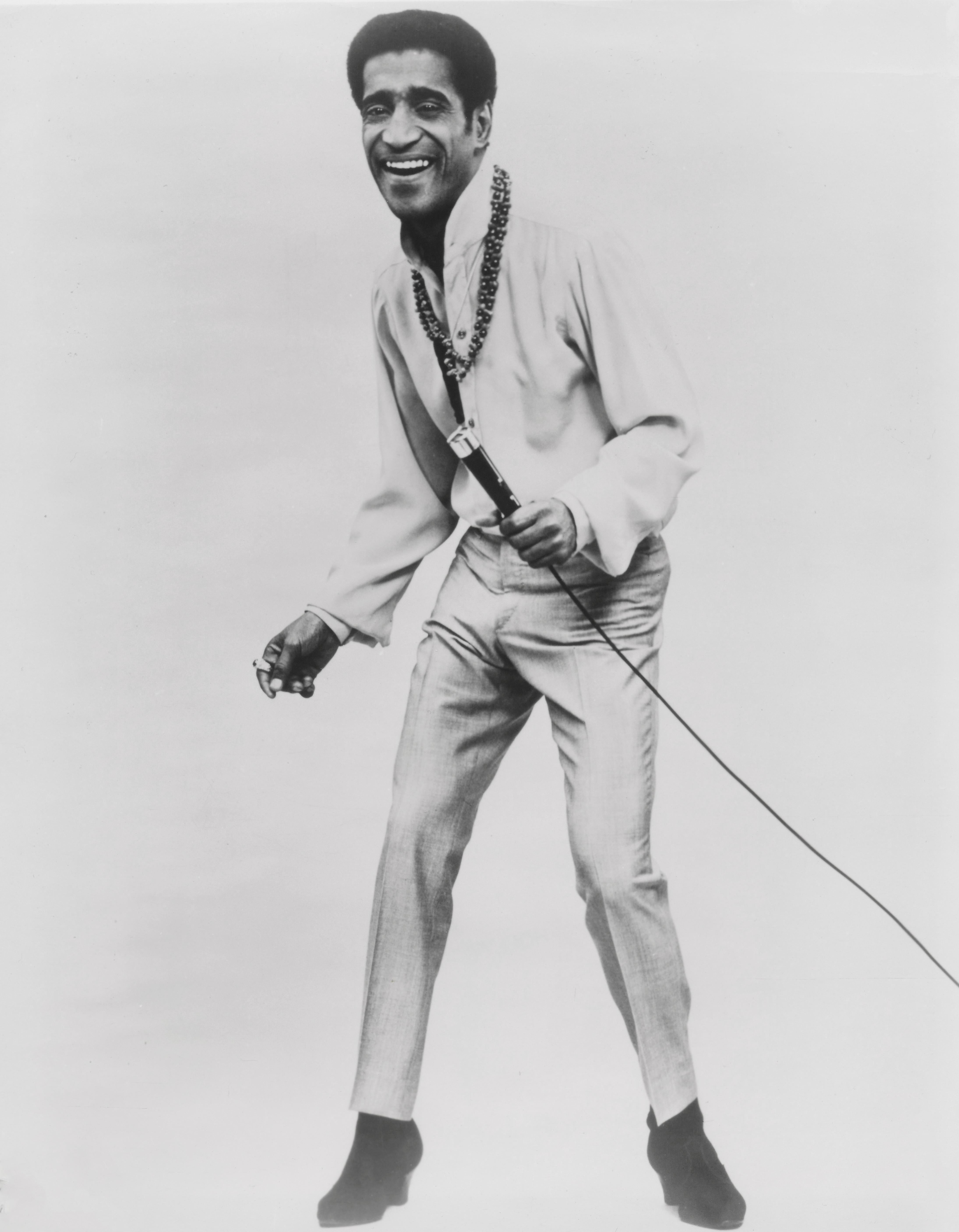 Unknown Portrait Photograph - Sammy Davis Jr. Smiling with Microphone Fine Art Print