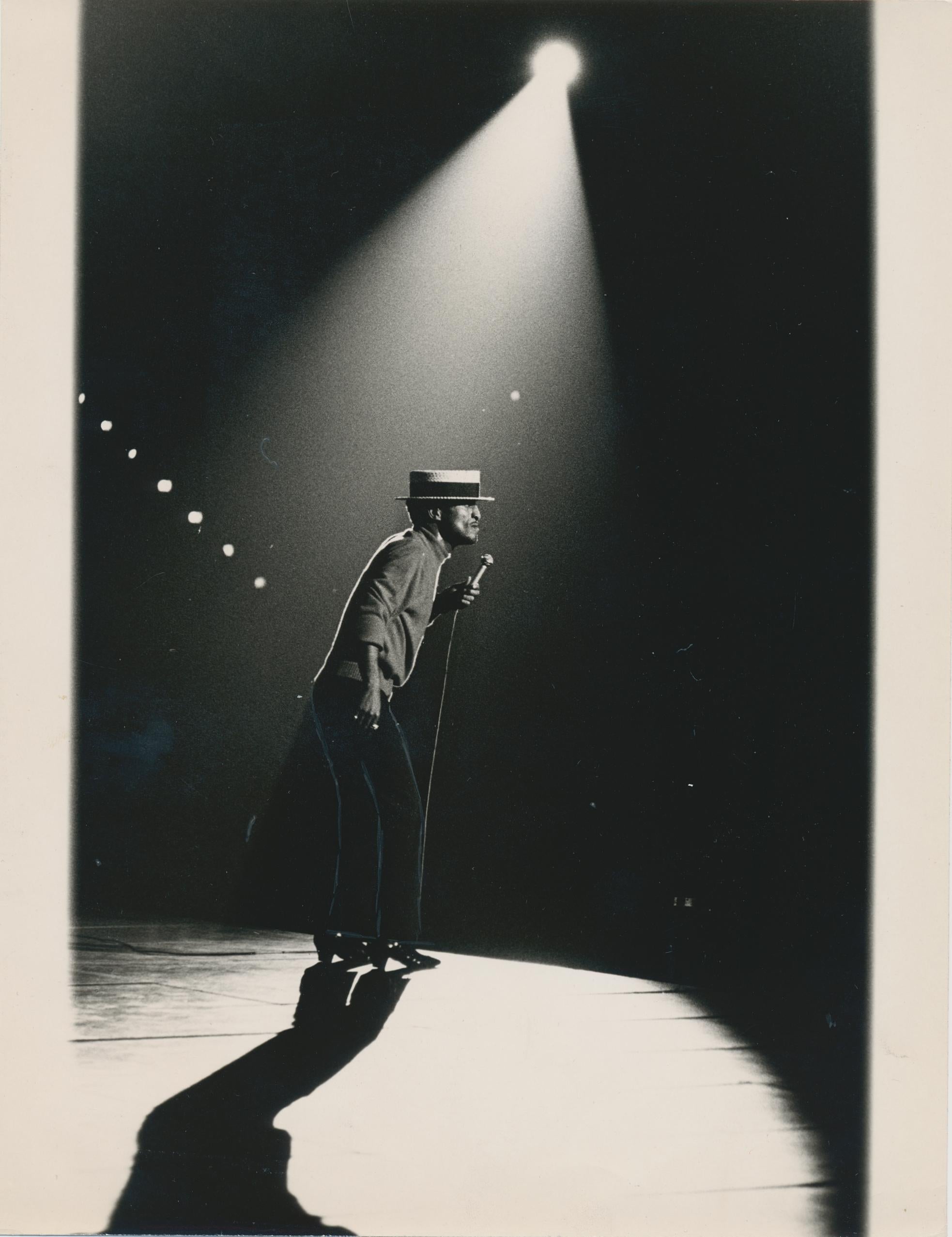 Unknown Black and White Photograph - Sammy Davis Jr., spotlight on stage, unknown date