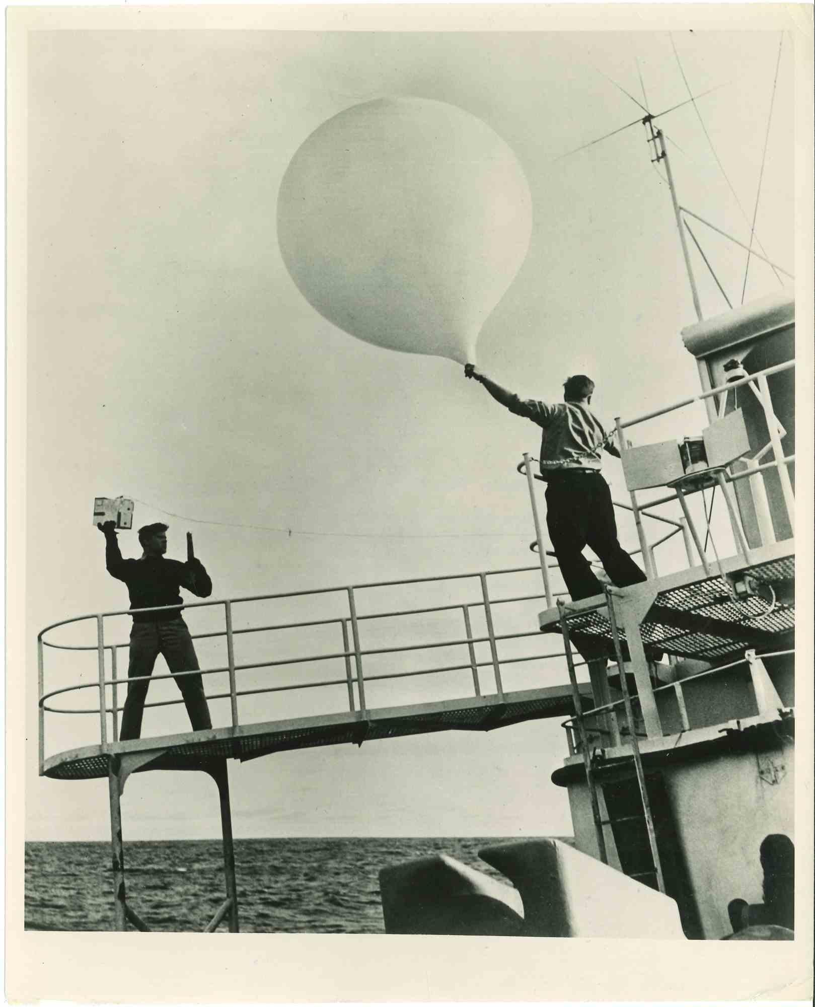 Unknown Figurative Photograph - Seamen Checking Weather - Vintage Photograph - Mid 20th Century