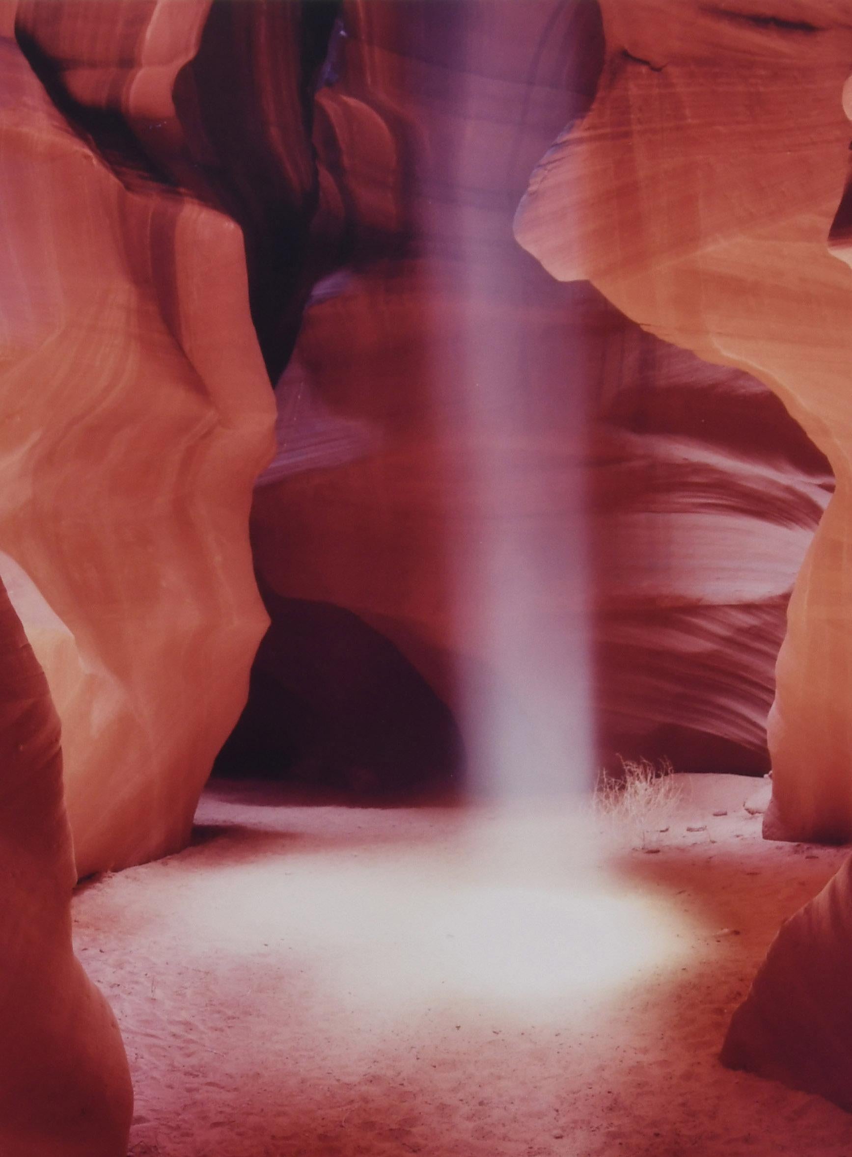 Shaft of light in Upper Antelope Canyon, near Page, Arizona, Navajo Nation - Photograph by Unknown