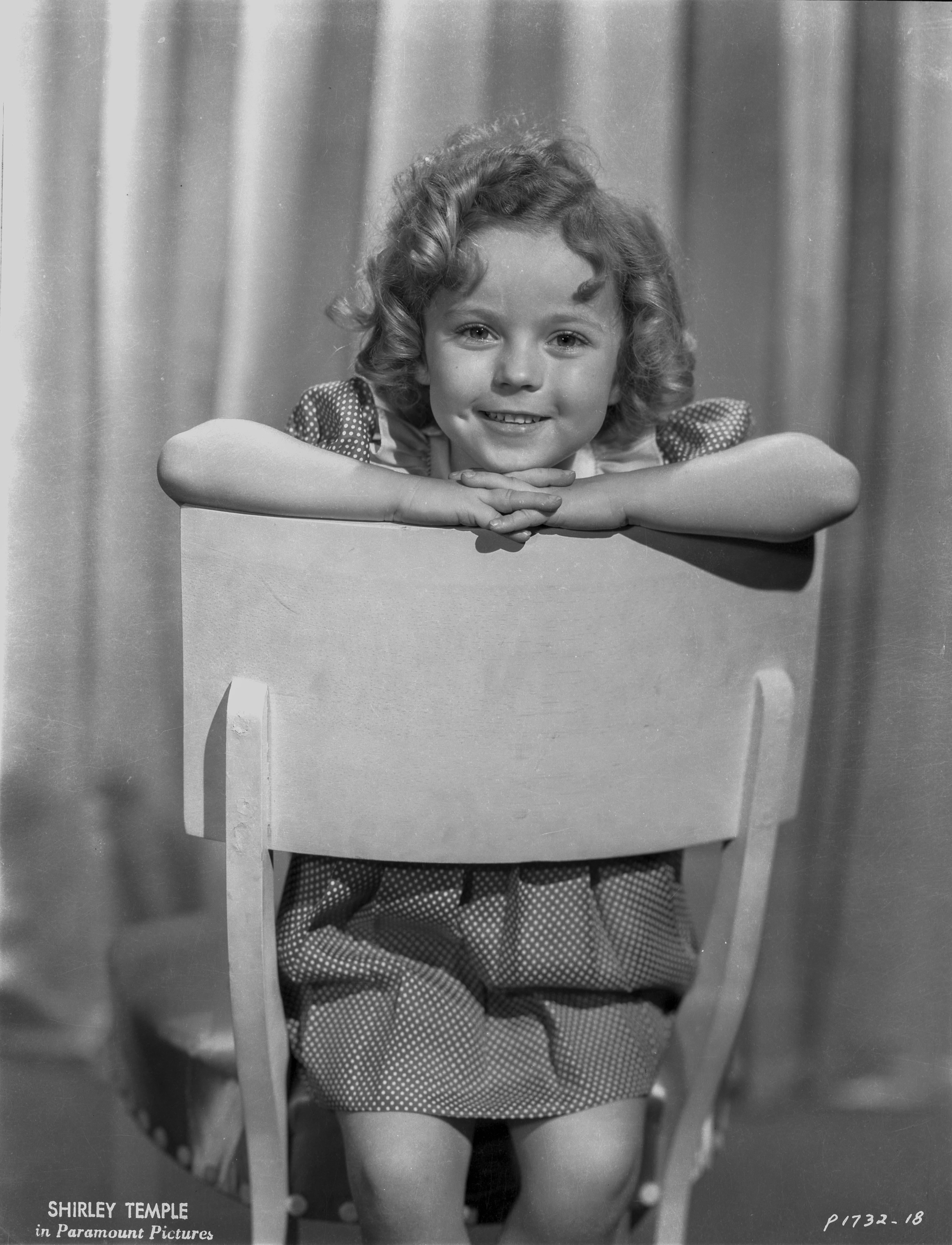 Unknown Black and White Photograph - Shirley Temple in Chair Fine Art Print